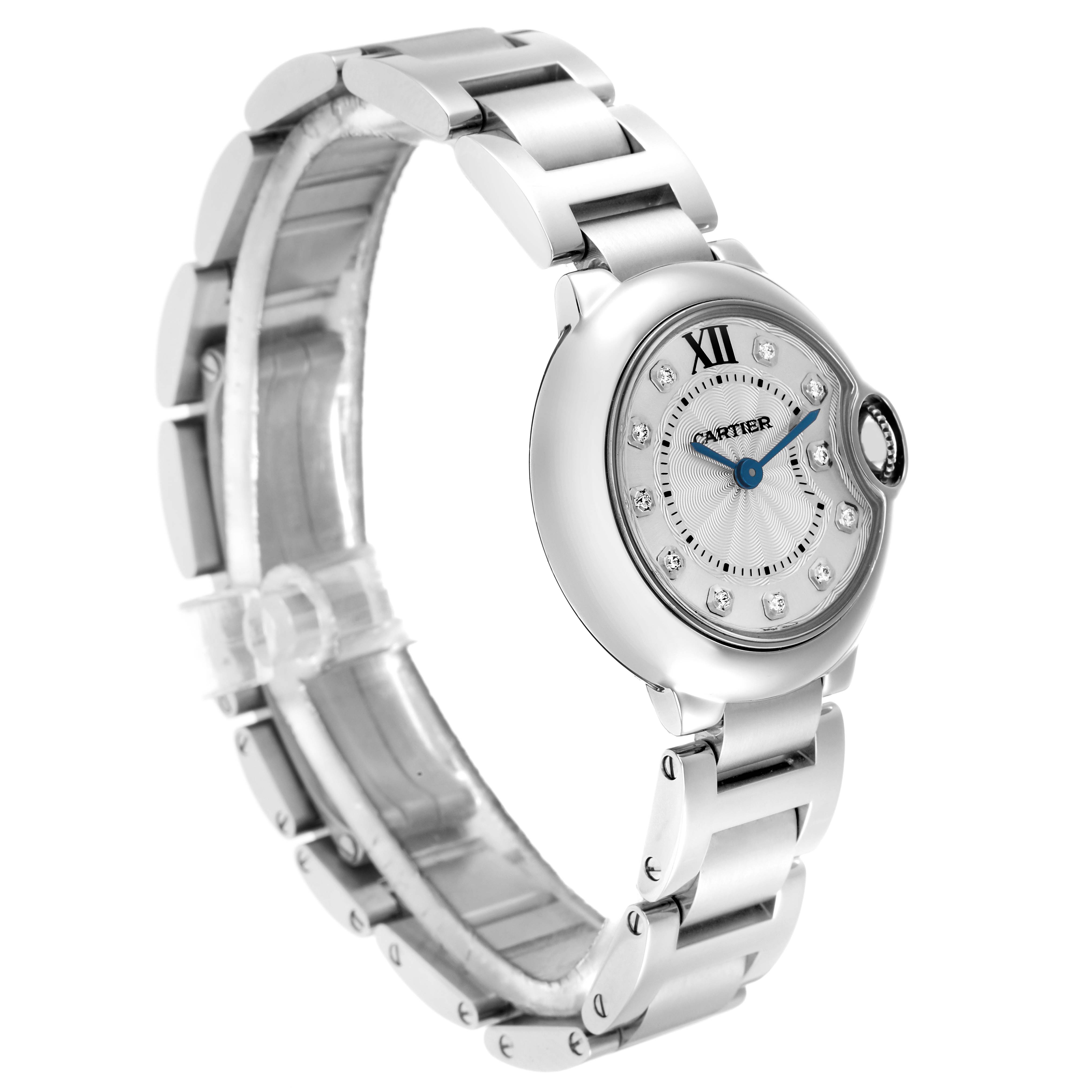 The Cartier Ballon Bleu WE902073 Women
s Stainless Steel Silver Dial watch is shown at a three-quarter angle, highlighting its face, case, crown, and metal bracelet.