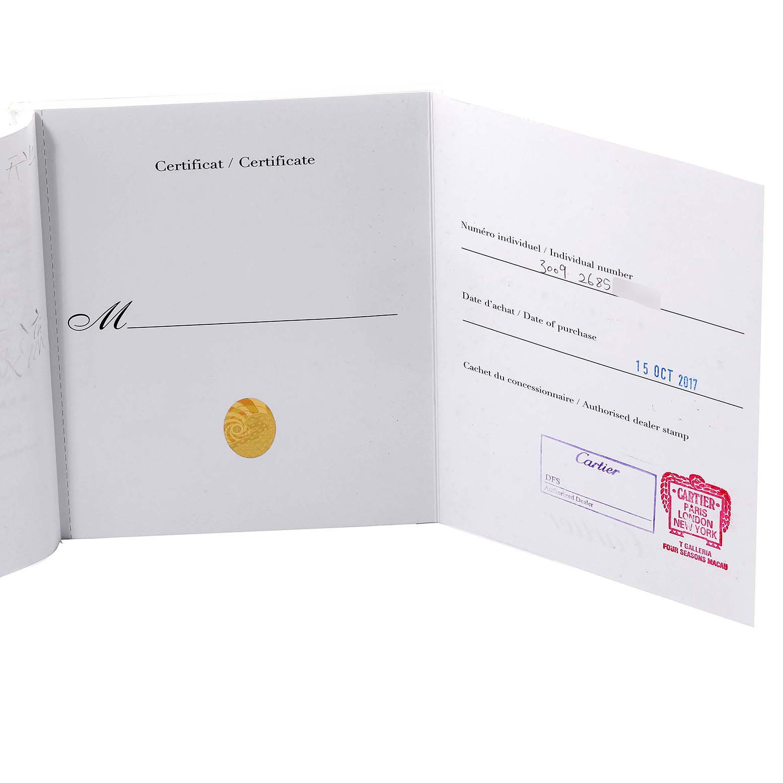 The image shows an open warranty certificate for a Ballon Bleu model watch by Cartier.