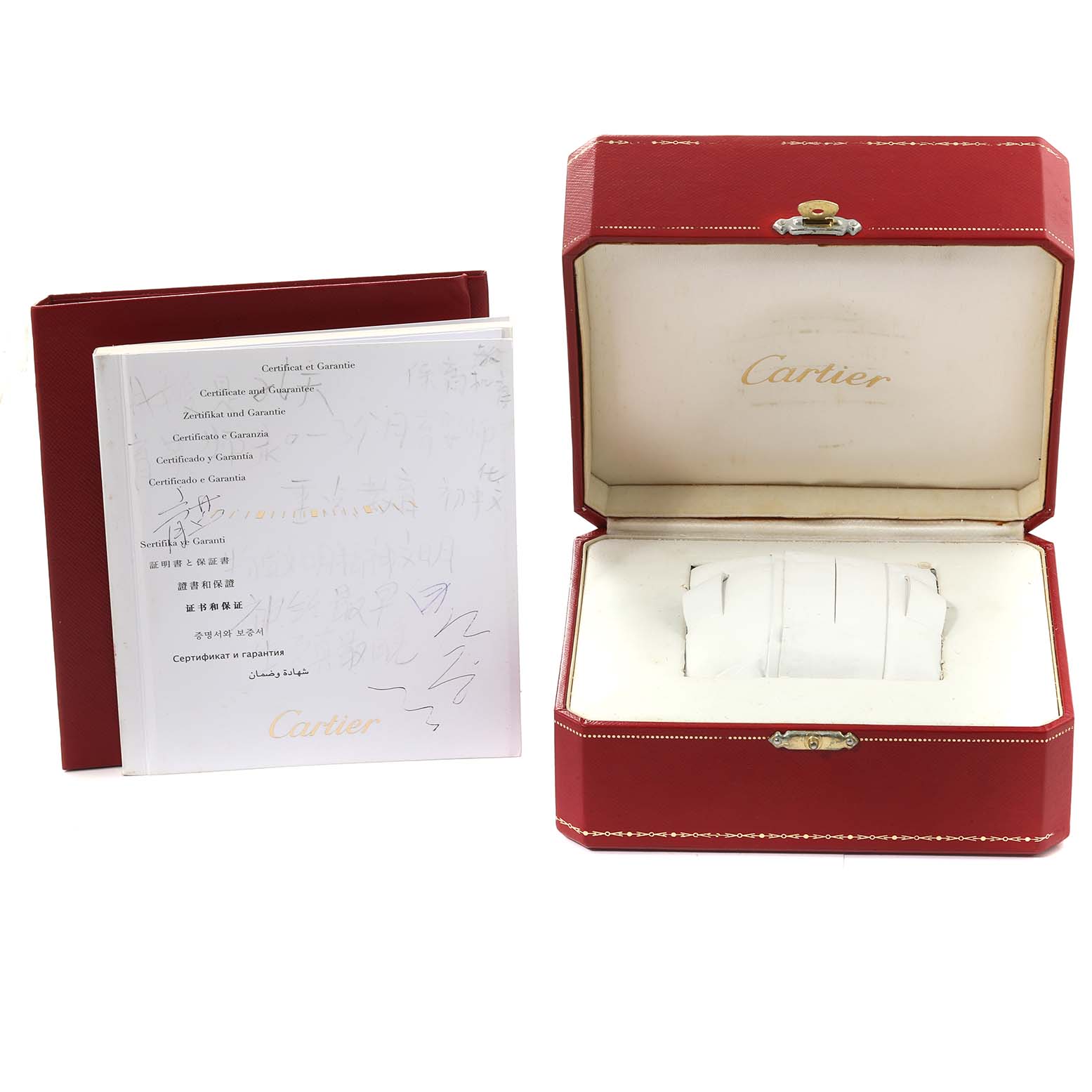 The image shows an open red Cartier watch box and a warranty booklet for the Ballon Bleu model.