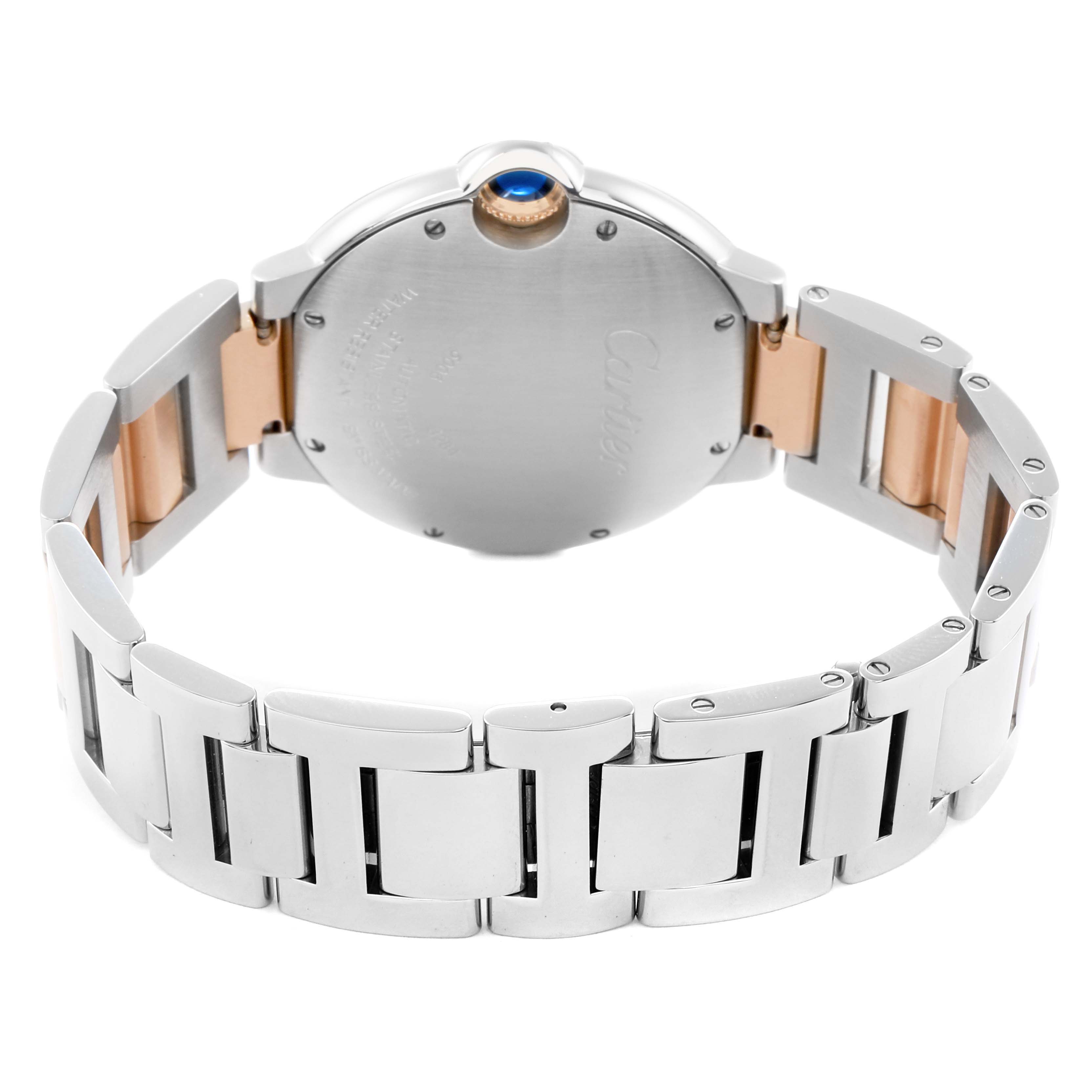 The image shows the back and bracelet of a Cartier Ballon Bleu W6920033 Women
s Stainless Steel Mother of Pearl Dial watch, highlighting the metal links and case back.