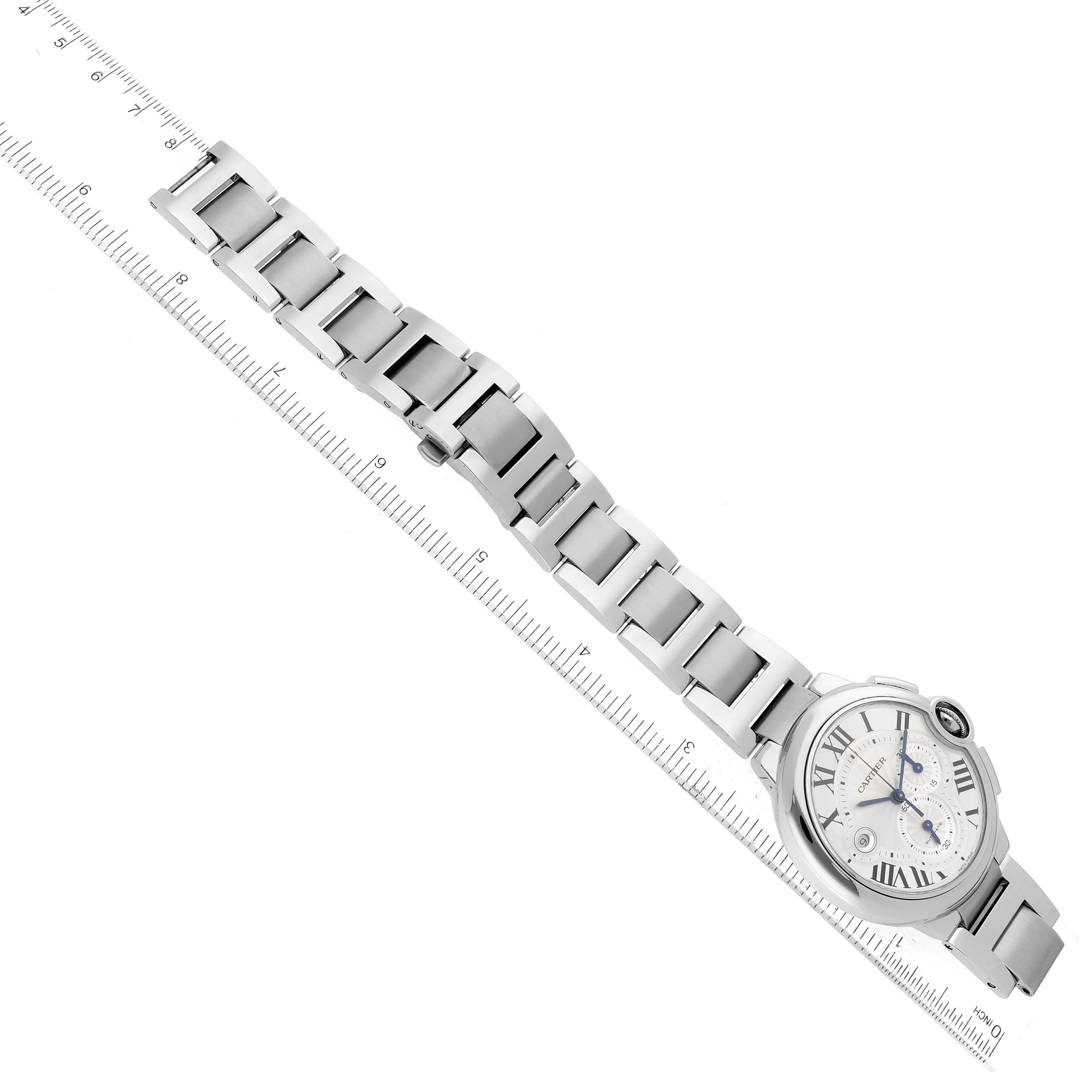 The image shows a top-down view of a Cartier Ballon Bleu 63810 Men's Stainless Steel Silver Dial 63810 Men's Stainless Steel Silver Dial watch, including its face and metal bracelet, measured against a ruler.