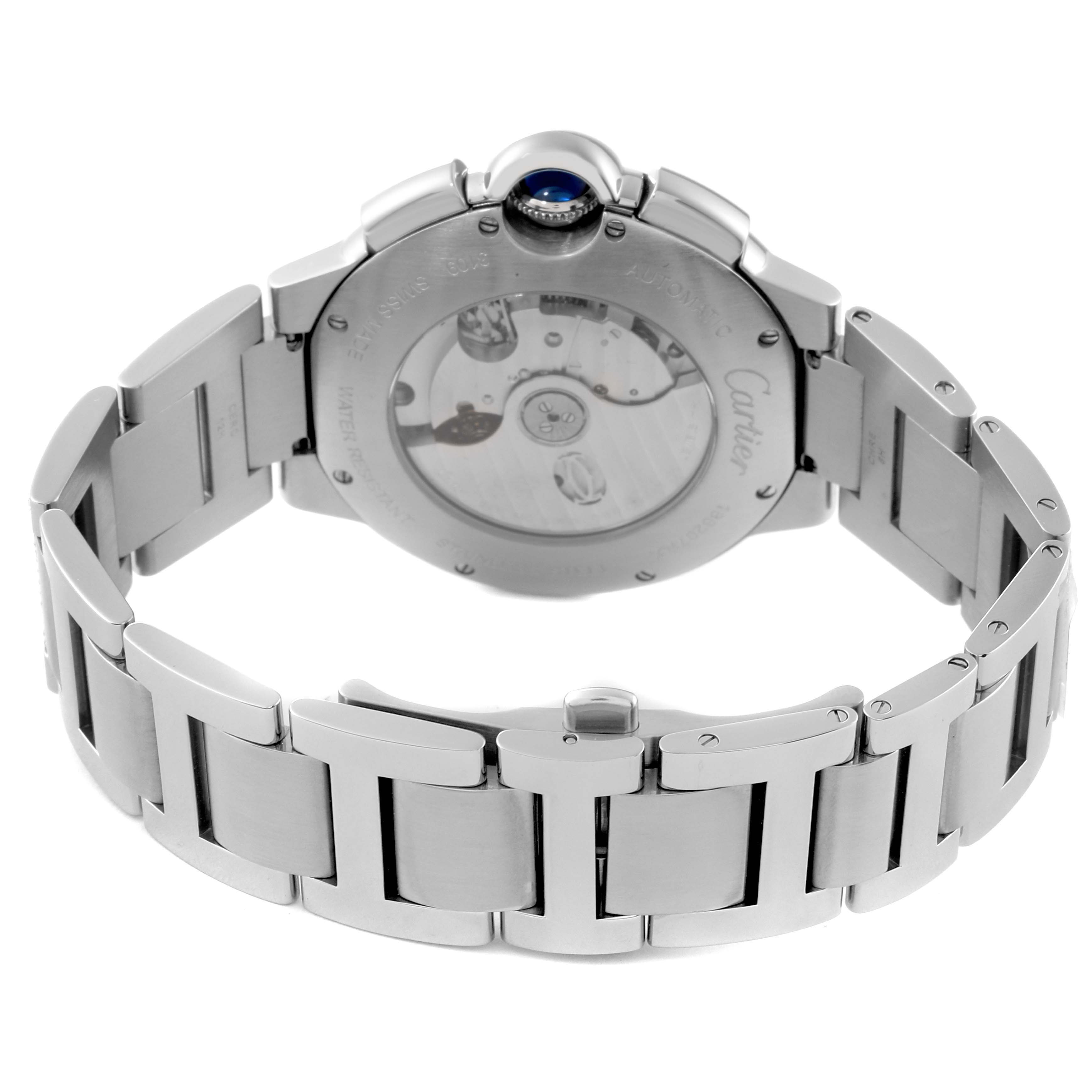 The image shows the back and bracelet of a Ballon Bleu model by Cartier, highlighting its stainless steel case and transparent case back.