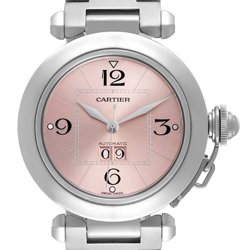 The Cartier Pasha W31058M7 Women's Stainless Steel Pink Dial watch is shown from the front, highlighting its pink dial, Arabic numerals, date window, and distinctive crown.
