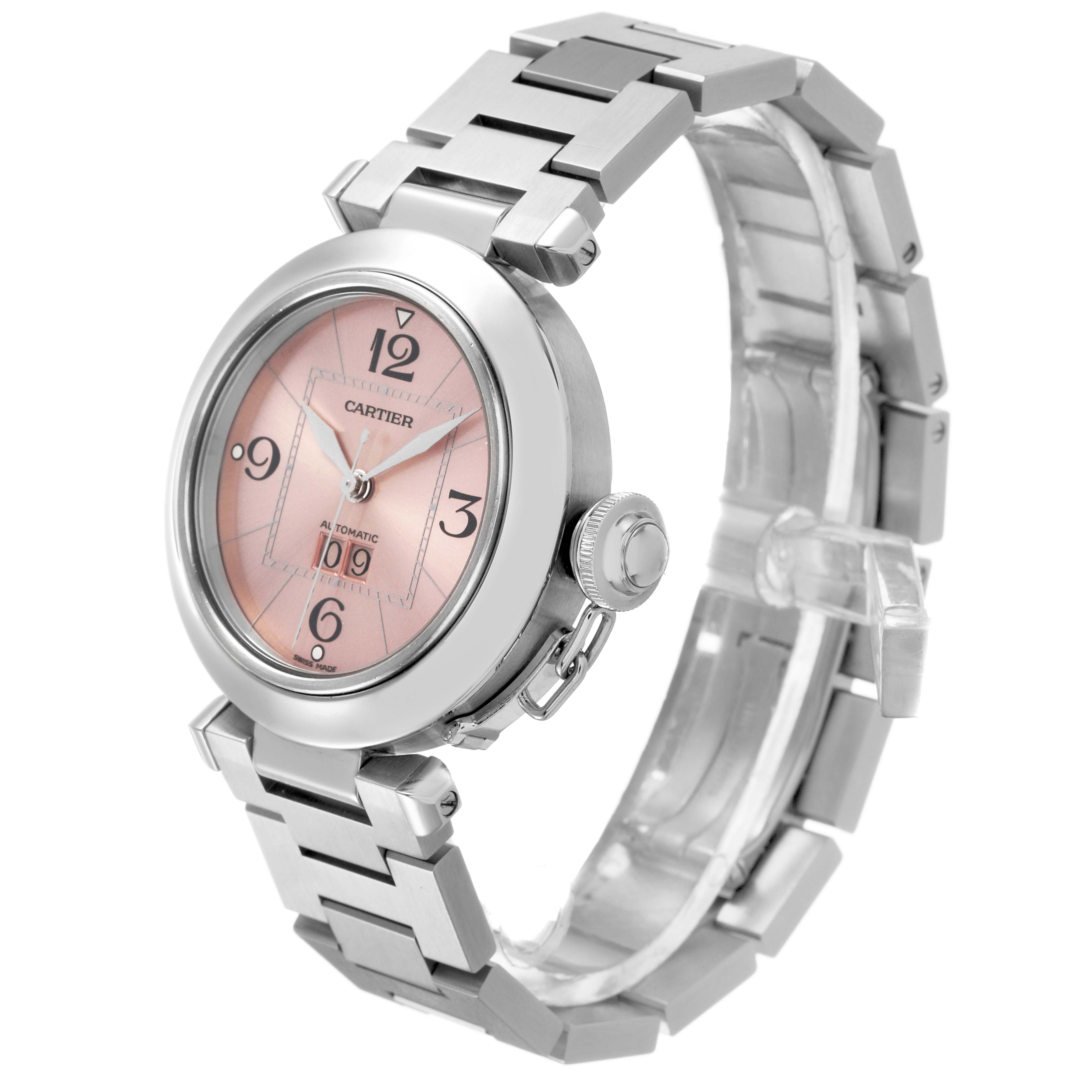 The Cartier Pasha W31058M7 Women's Stainless Steel Pink Dial watch is shown at a three-quarter angle, highlighting the face, case, strap, and crown.