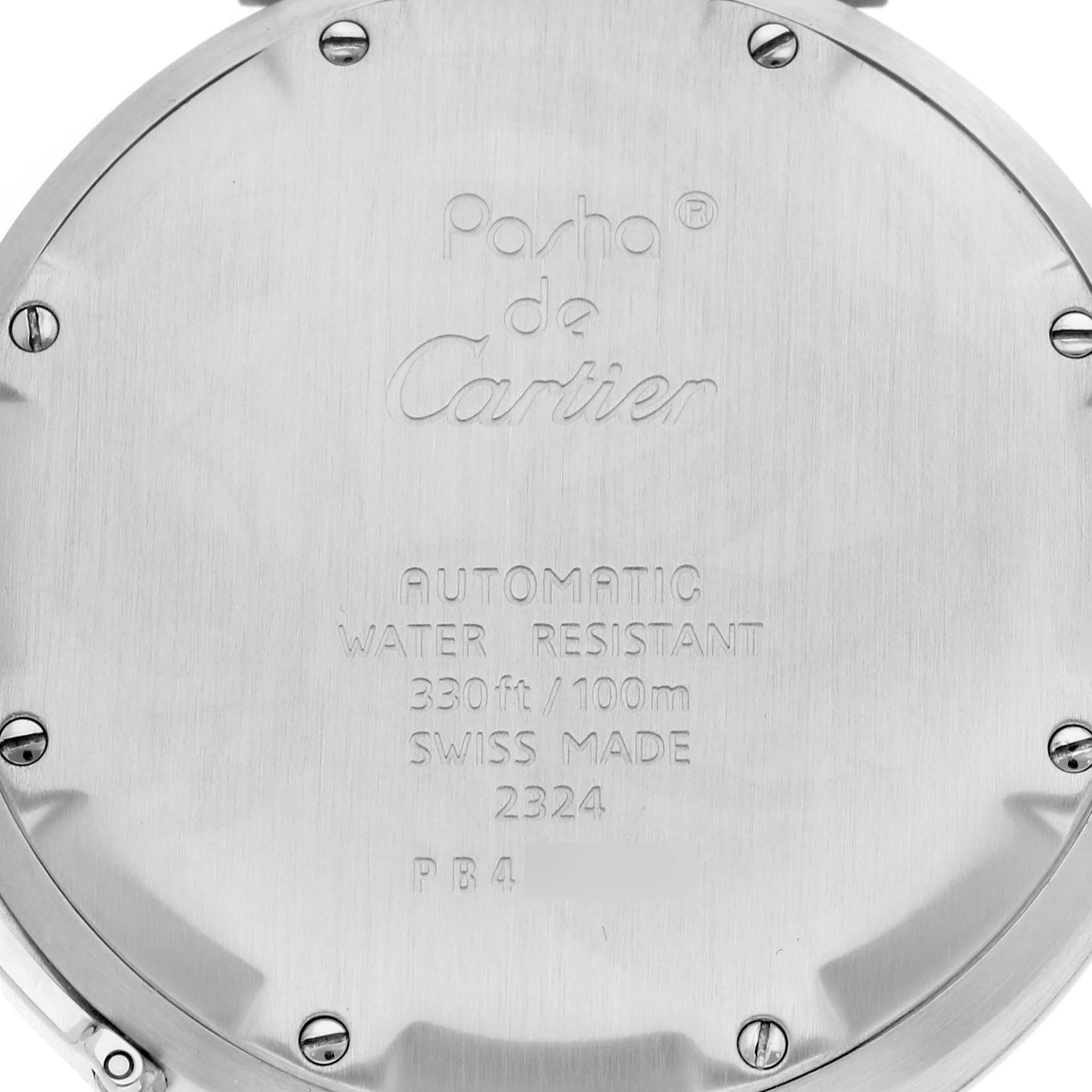 The image shows the back case of a Cartier Pasha W31024M7 Men
s Stainless Steel Pink Dial watch, featuring engraved details and securing screws.