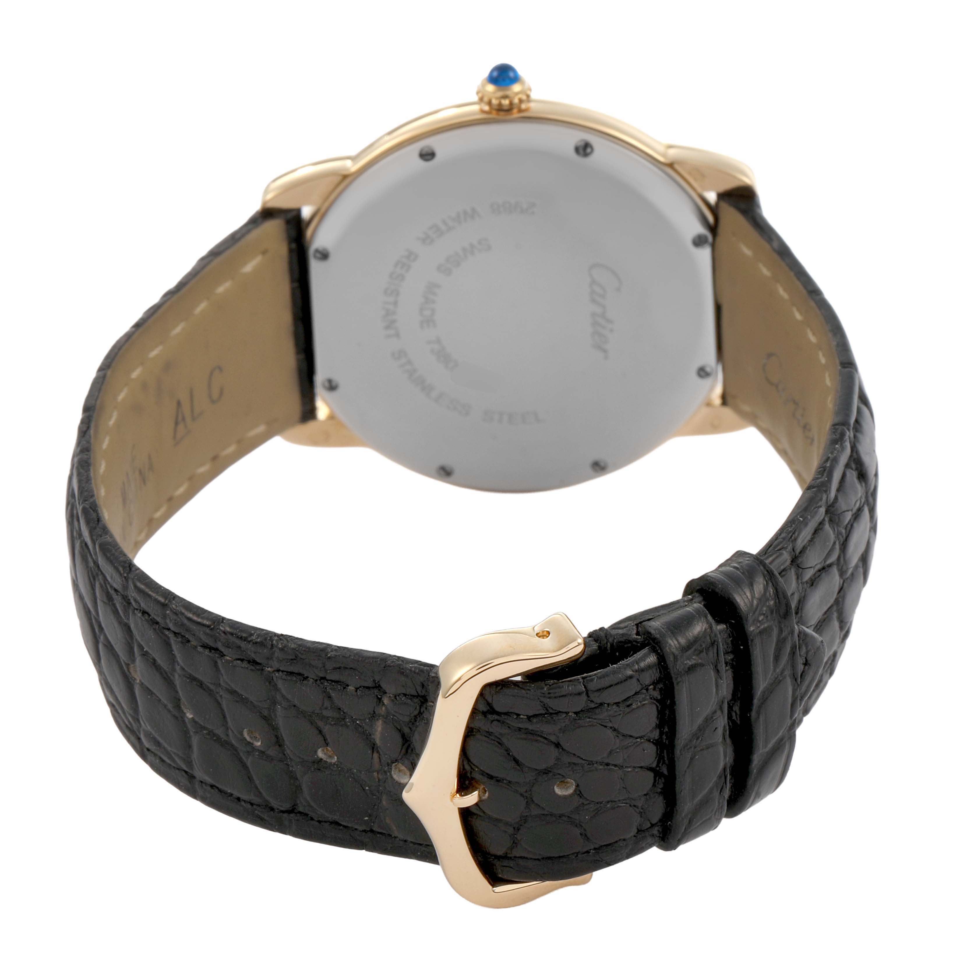 The image shows the back of a Cartier Ronde W6700455 Men's Yellow Gold Silver Dial watch, featuring its clasp, leather strap, and case back.