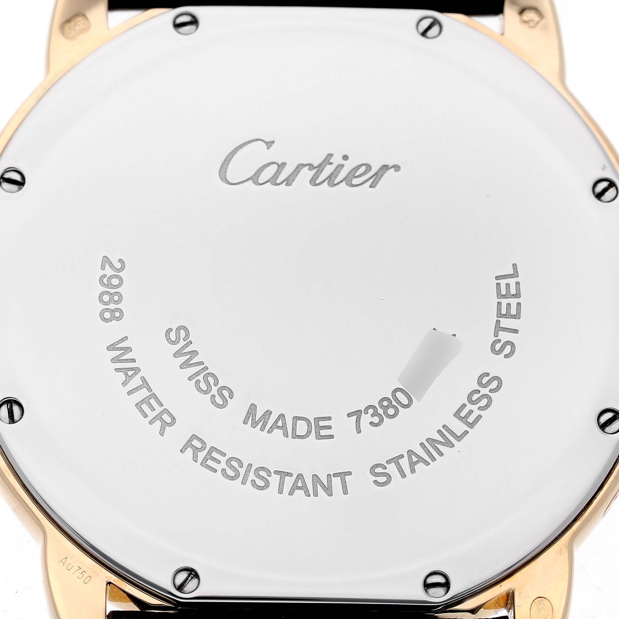 The image shows the back of a Cartier Ronde W6700455 Men's Yellow Gold Silver Dial, displaying the brand name and model details engraved on the stainless steel case.