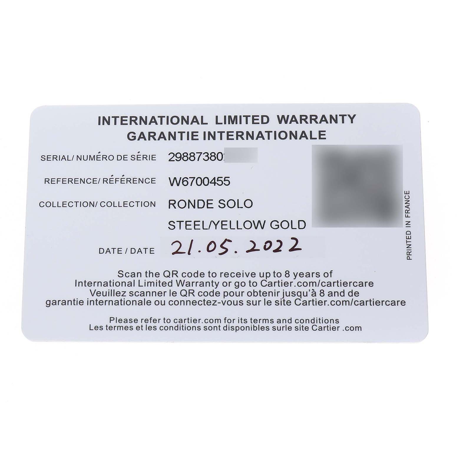 This image shows an international warranty card for the Cartier Ronde W6700455 Men's Yellow Gold Silver Dial Solo watch.