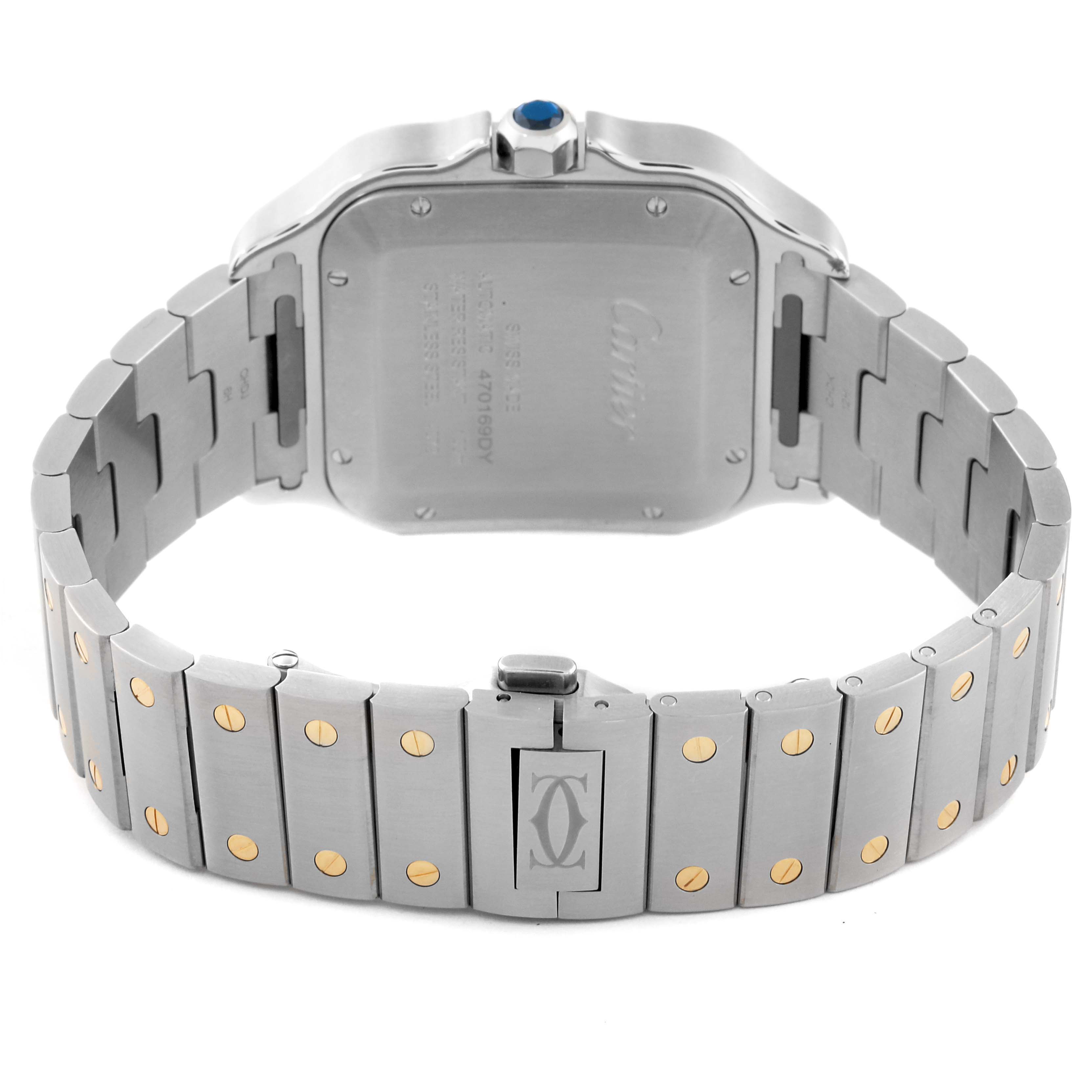 The image shows the back and bracelet of a Santos model by Cartier, with a focus on the case back and bracelet details.