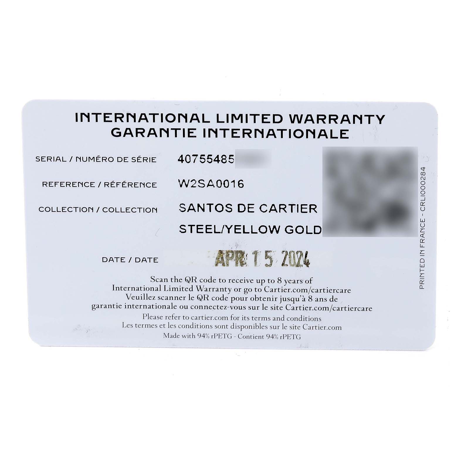 This image shows an International Limited Warranty card for a Santos de Cartier watch model W2SA0016 made of steel and yellow gold.