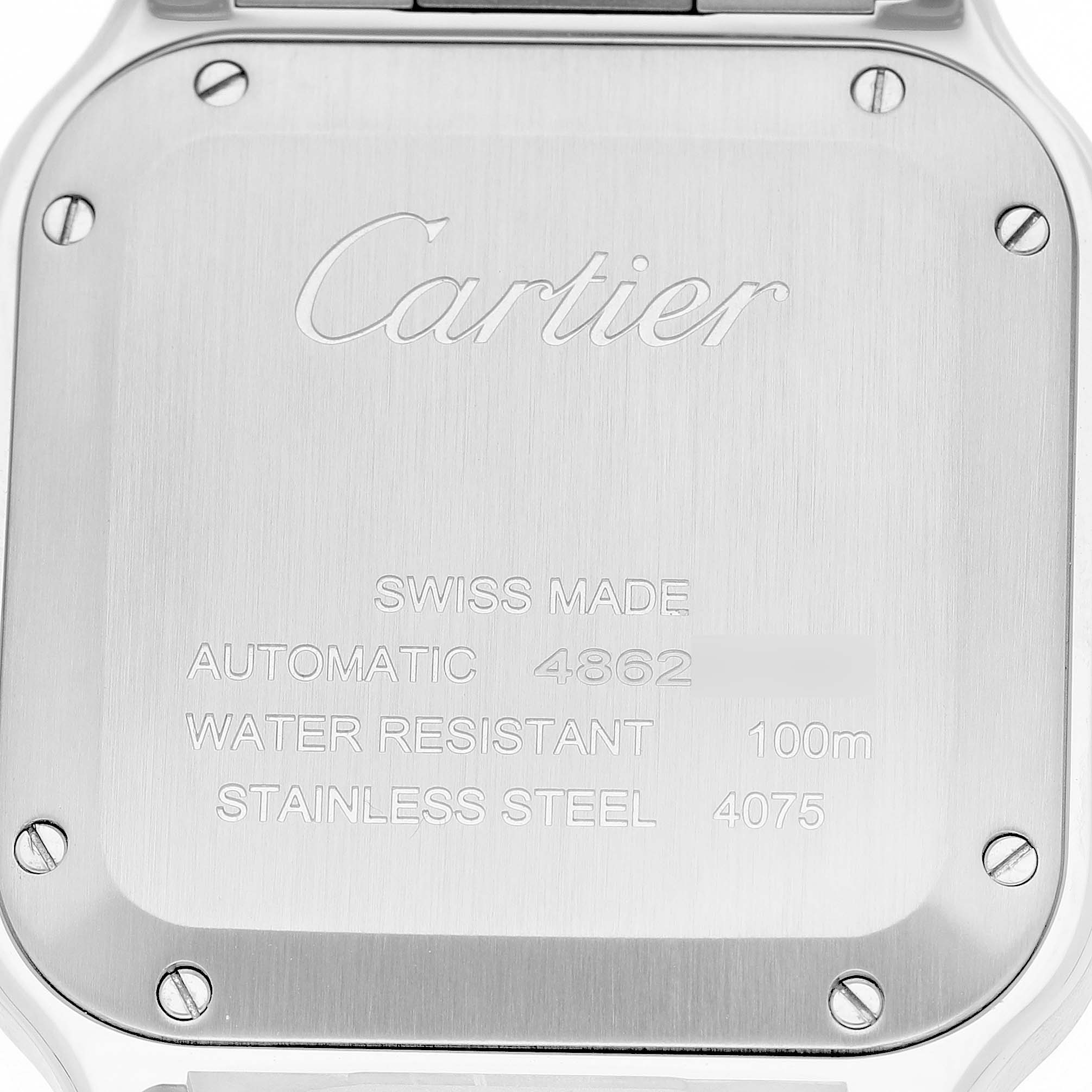 The image shows the back case of a Cartier Santos W4SA0005 Men's Stainless Steel Silver Dial watch with engraved details.