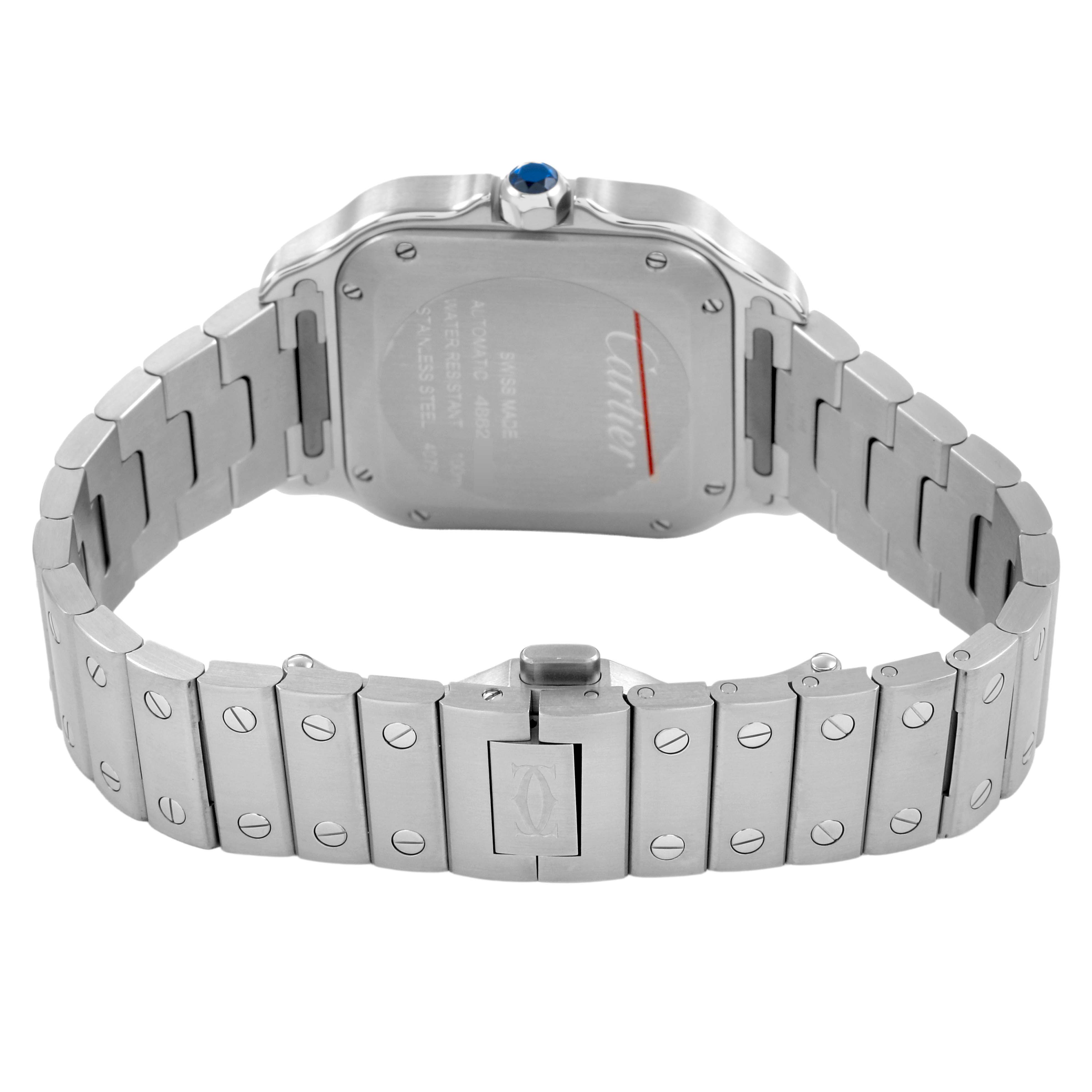 The Cartier Santos W4SA0005 Men's Stainless Steel Silver Dial watch is shown from the back, featuring its bracelet and case back with a blue cabochon on the crown.