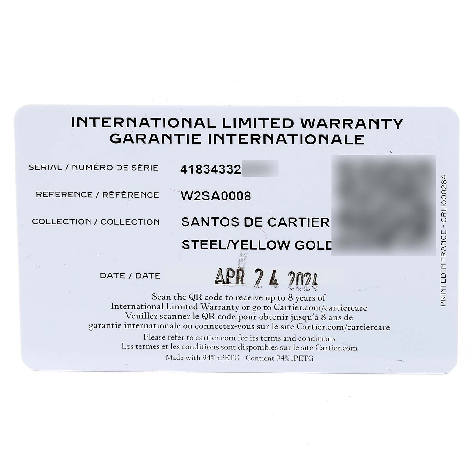 This is the International Limited Warranty card for a Santos de Cartier watch, showing the serial number, reference number, and purchase date.