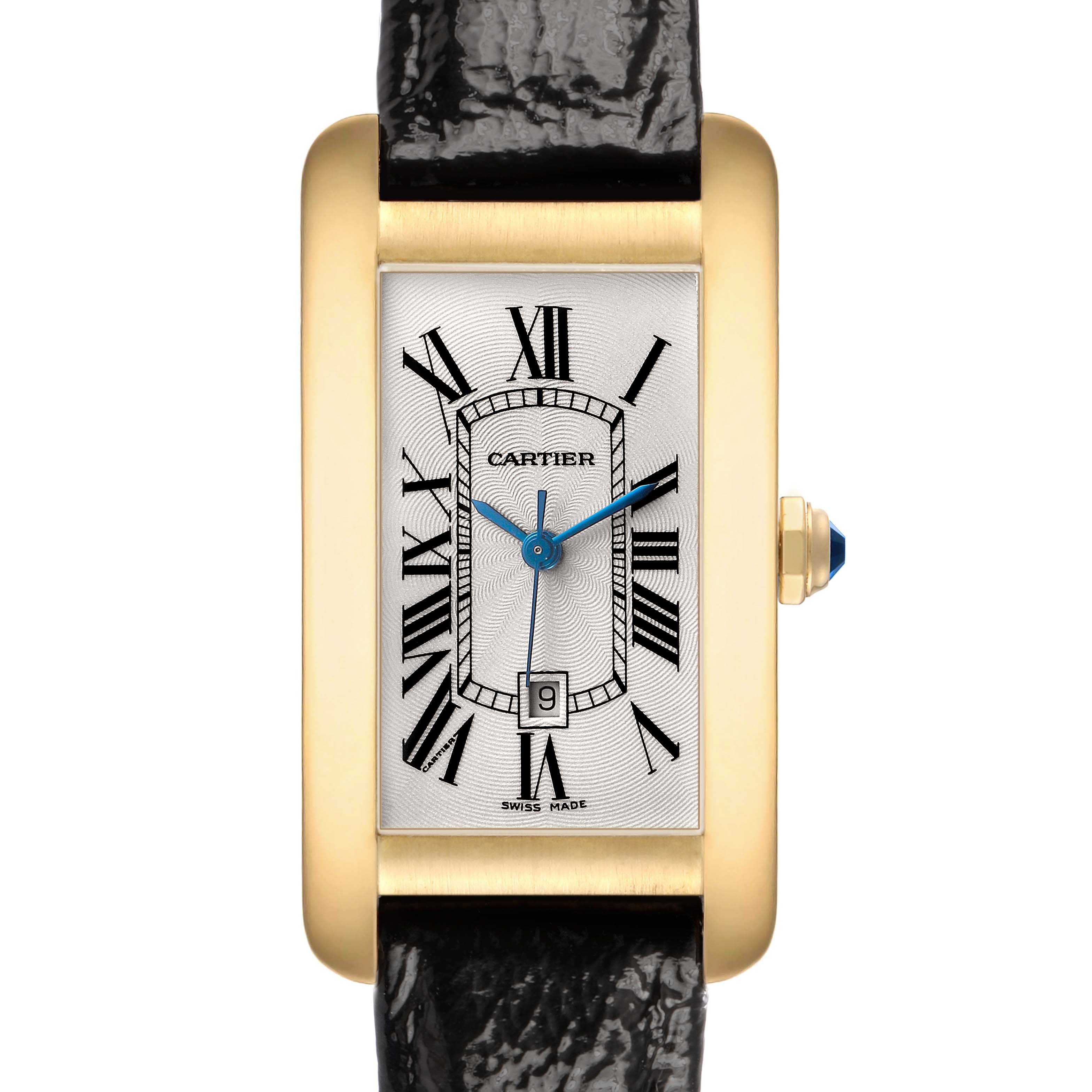 The Cartier Tank Américaine watch is shown from the front with its gold rectangular case, Roman numeral dial, blue hands, and crown.