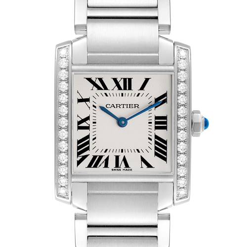 The Cartier Tank Française watch is shown from the front, highlighting its face, Roman numerals, and diamond-set case.
