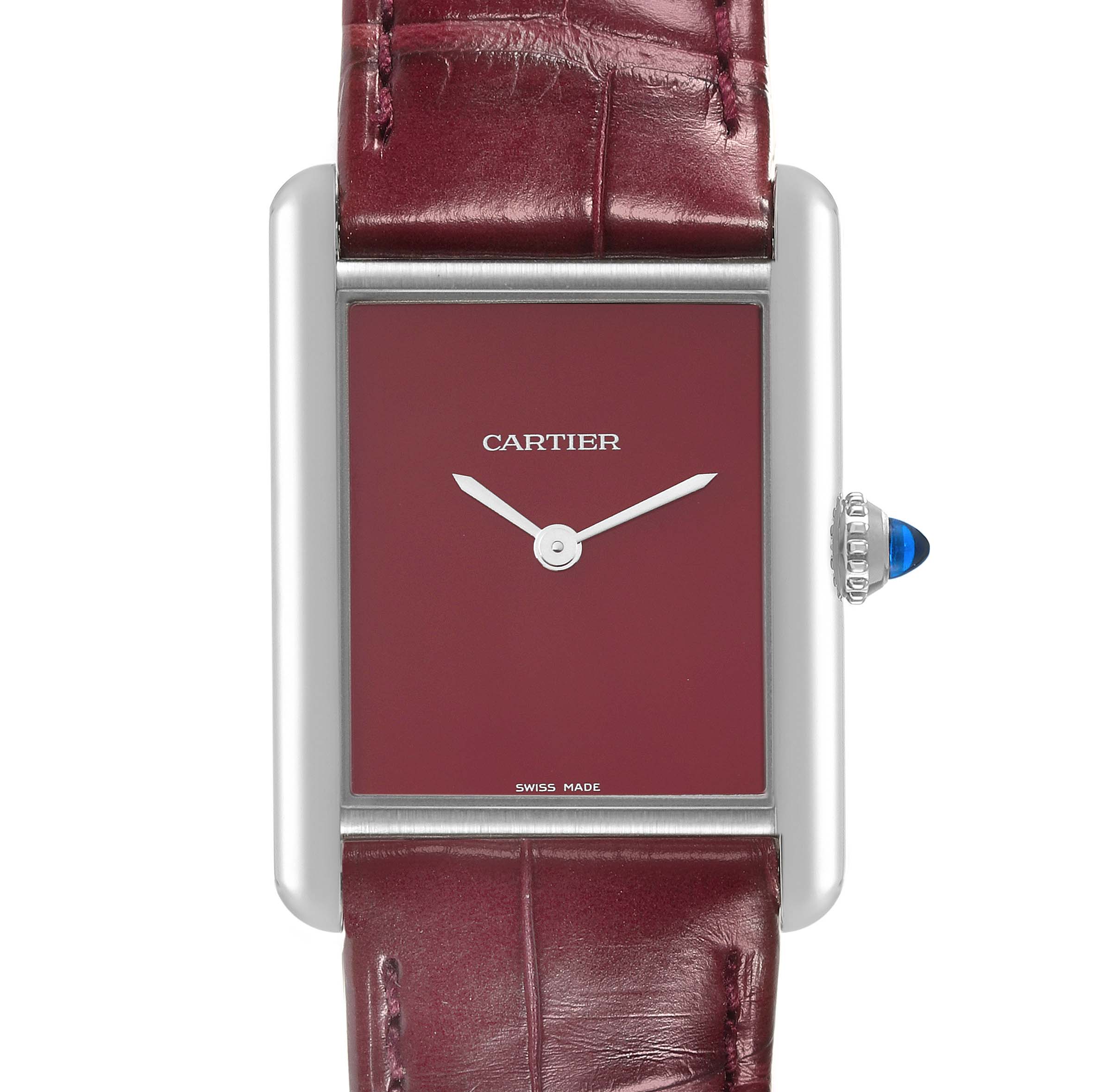 The image shows a front view of a Cartier Tank Must WSTA0054 Women's Stainless Steel Red Dial WSTA0054 Women's Stainless Steel Red Dial watch with a burgundy dial and leather strap.