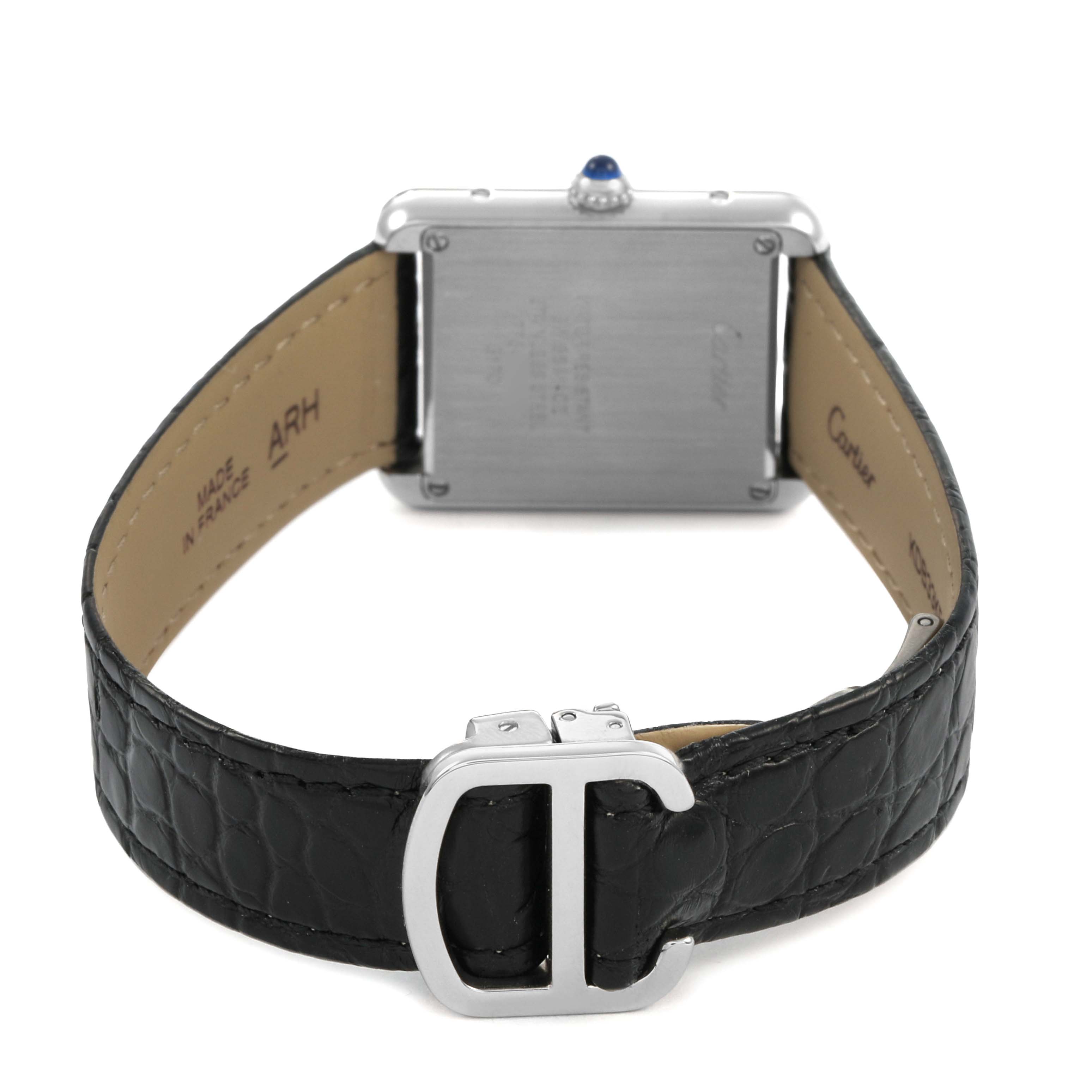 The image shows the back view of a Cartier Tank Solo W5200005 Women's Stainless Steel Silver Dial watch, highlighting the clasp and leather strap.