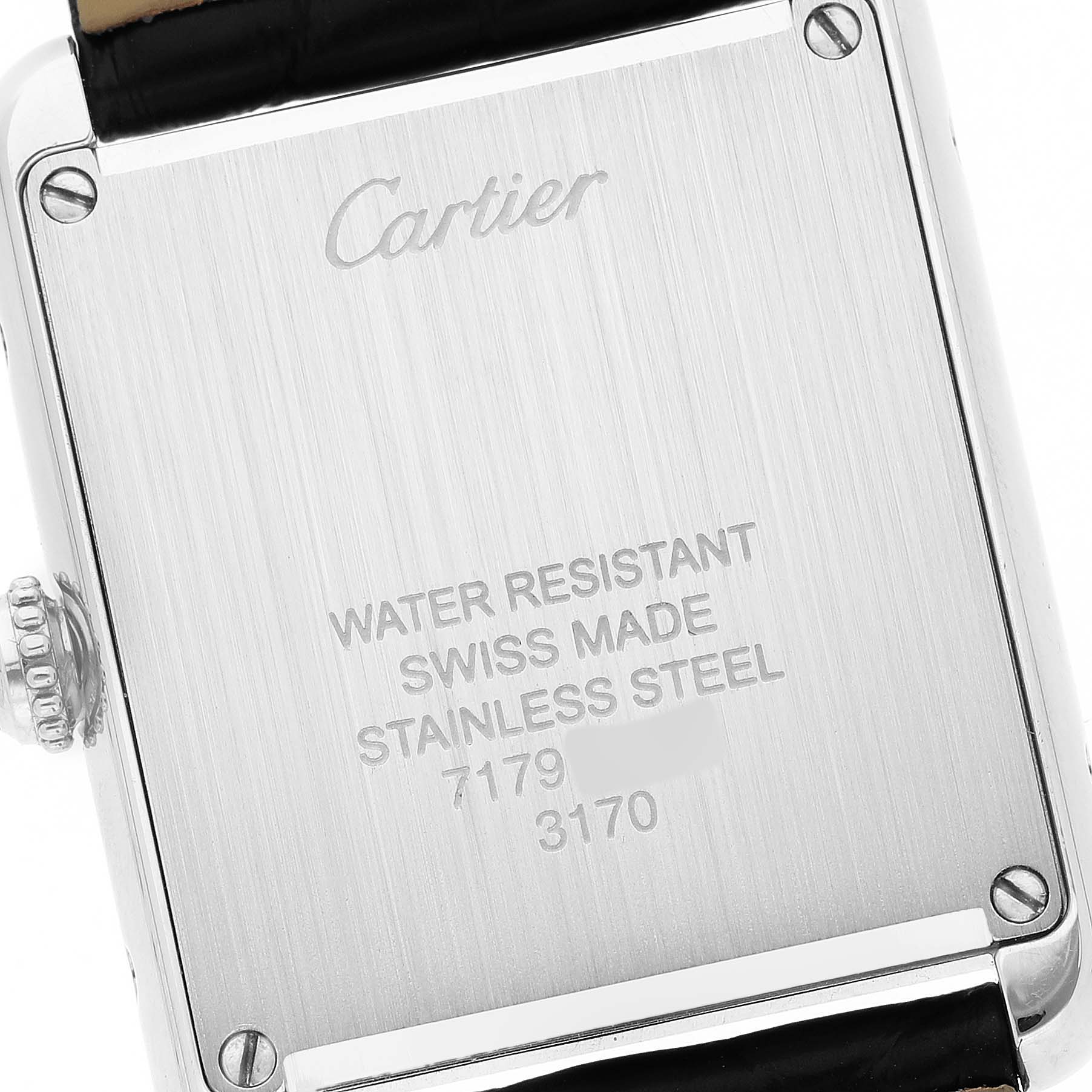 The image shows the back case of a Cartier Tank Solo W5200005 Women's Stainless Steel Silver Dial watch, highlighting the water resistance and stainless steel details.