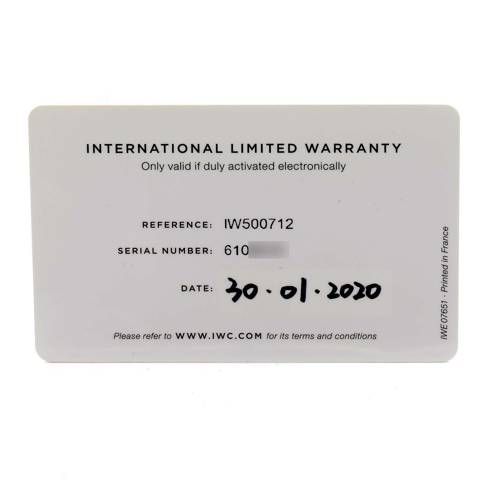The image shows an IWC Portuguese IW500712 Men
s Stainless Steel Silver Dial model international limited warranty card from a direct angle.