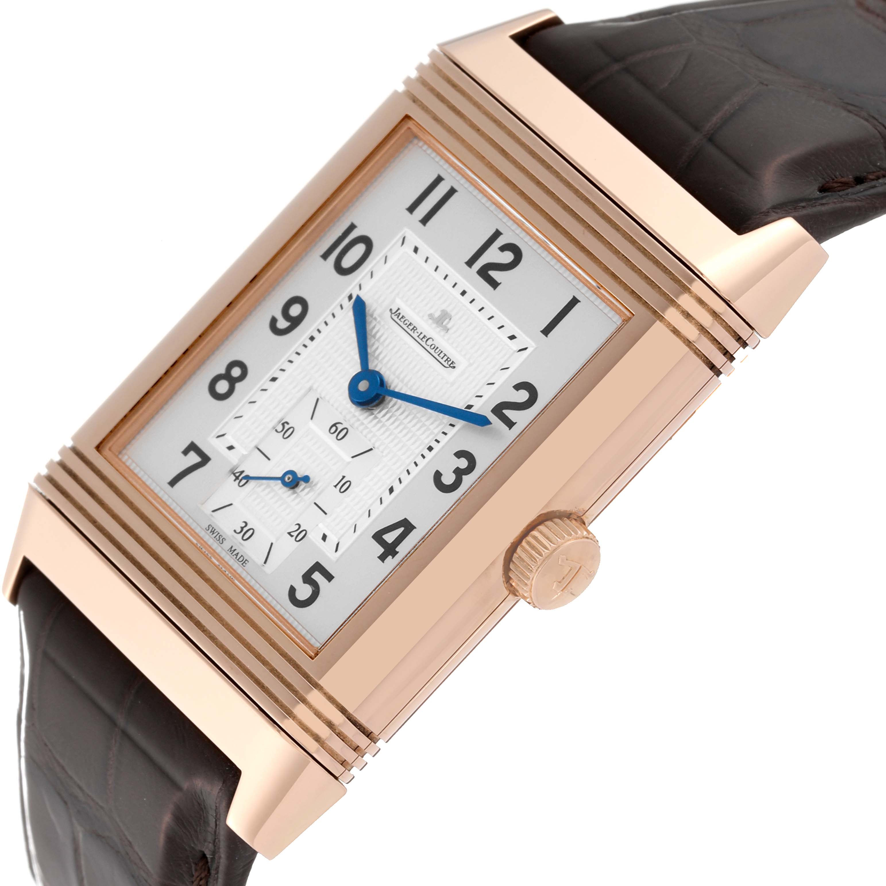 The Jaeger LeCoultre Reverso Q3732420 Men
s Rose Gold Silver Dial Q3732420 Men
s Rose Gold Silver Dial watch is shown at an angled side view, displaying the face, case, crown, and strap.