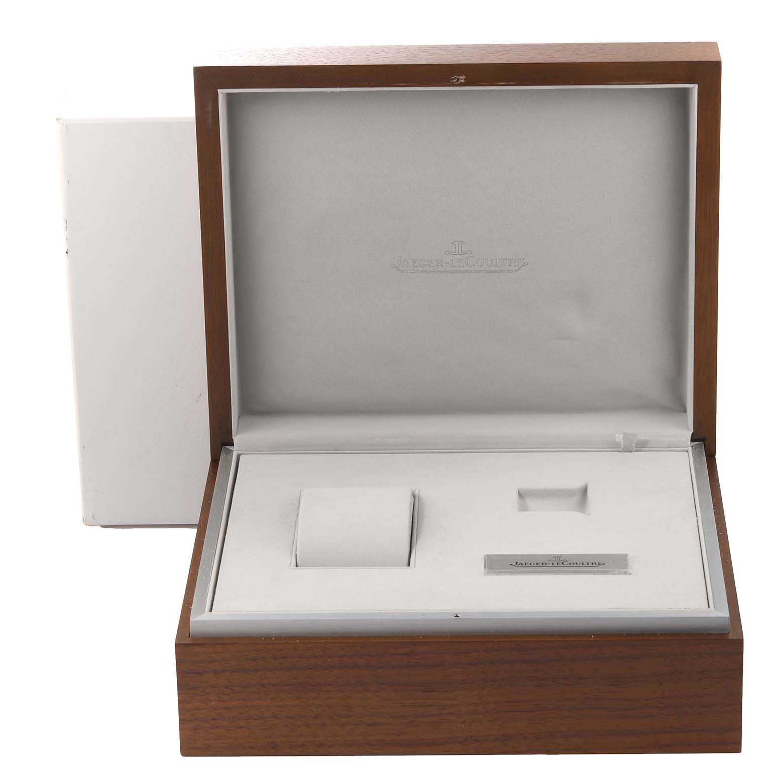 The image shows an open Jaeger LeCoultre Reverso Q3732420 Men
s Rose Gold Silver Dial Q3732420 Men
s Rose Gold Silver Dial watch box with compartments for the watch and accessories.