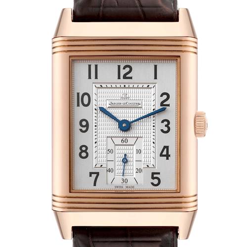 The image shows a front angle of a Jaeger LeCoultre Reverso watch, highlighting its dial, hands, case, and strap attachment.