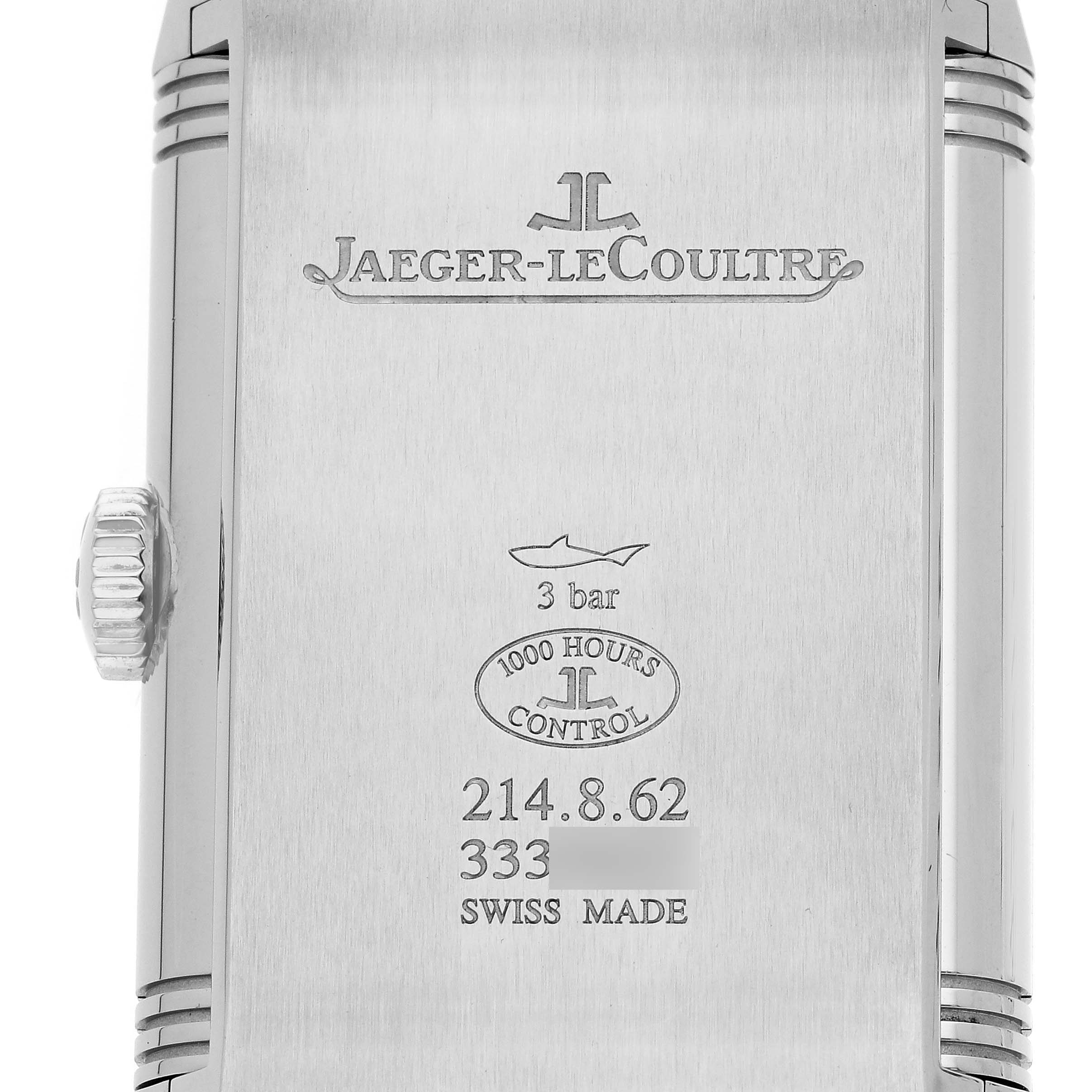 The image shows the back of a Jaeger-LeCoultre Reverso model, displaying logos, water resistance, and the crown.