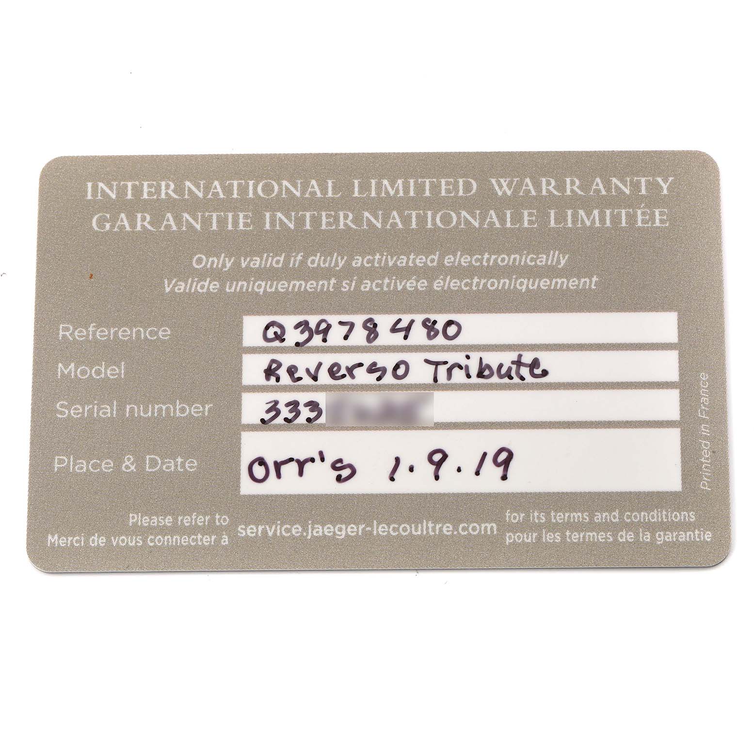 The image shows an International Limited Warranty card for a Jaeger LeCoultre Reverso 214.8.62 Q3978480 Men
s Stainless Steel Blue Dial model.