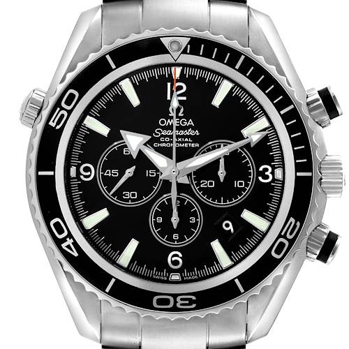 The Omega Planet Ocean watch is shown from a front angle, displaying the bezel, dial, hands, and pushers.