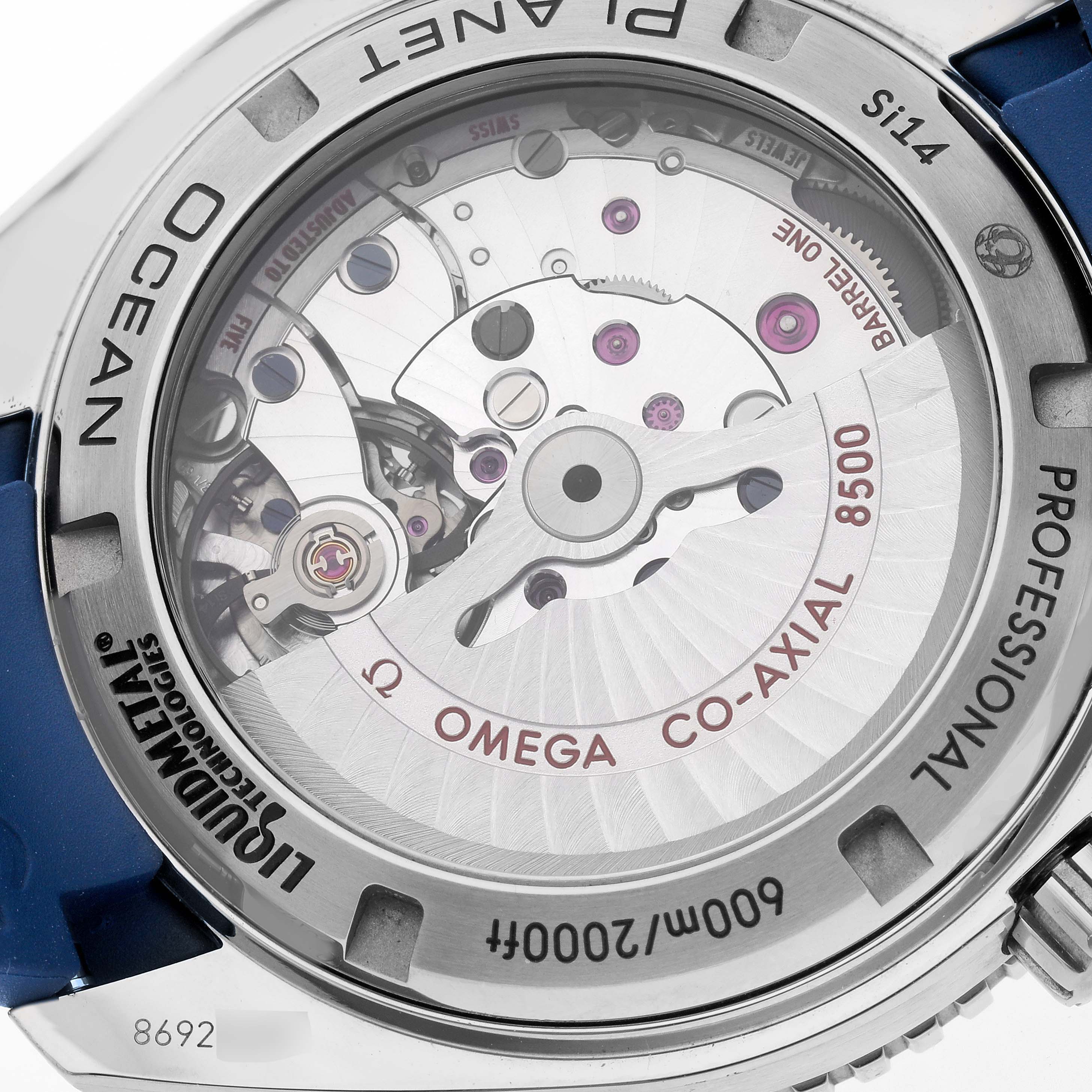 This is a close-up shot of the back of an Omega Planet Ocean 232.92.42.21.03.001 Men
s Titanium Blue Dial 232.92.42.21.03.001 Men
s Titanium Blue Dial watch, showcasing the inner mechanical movement.