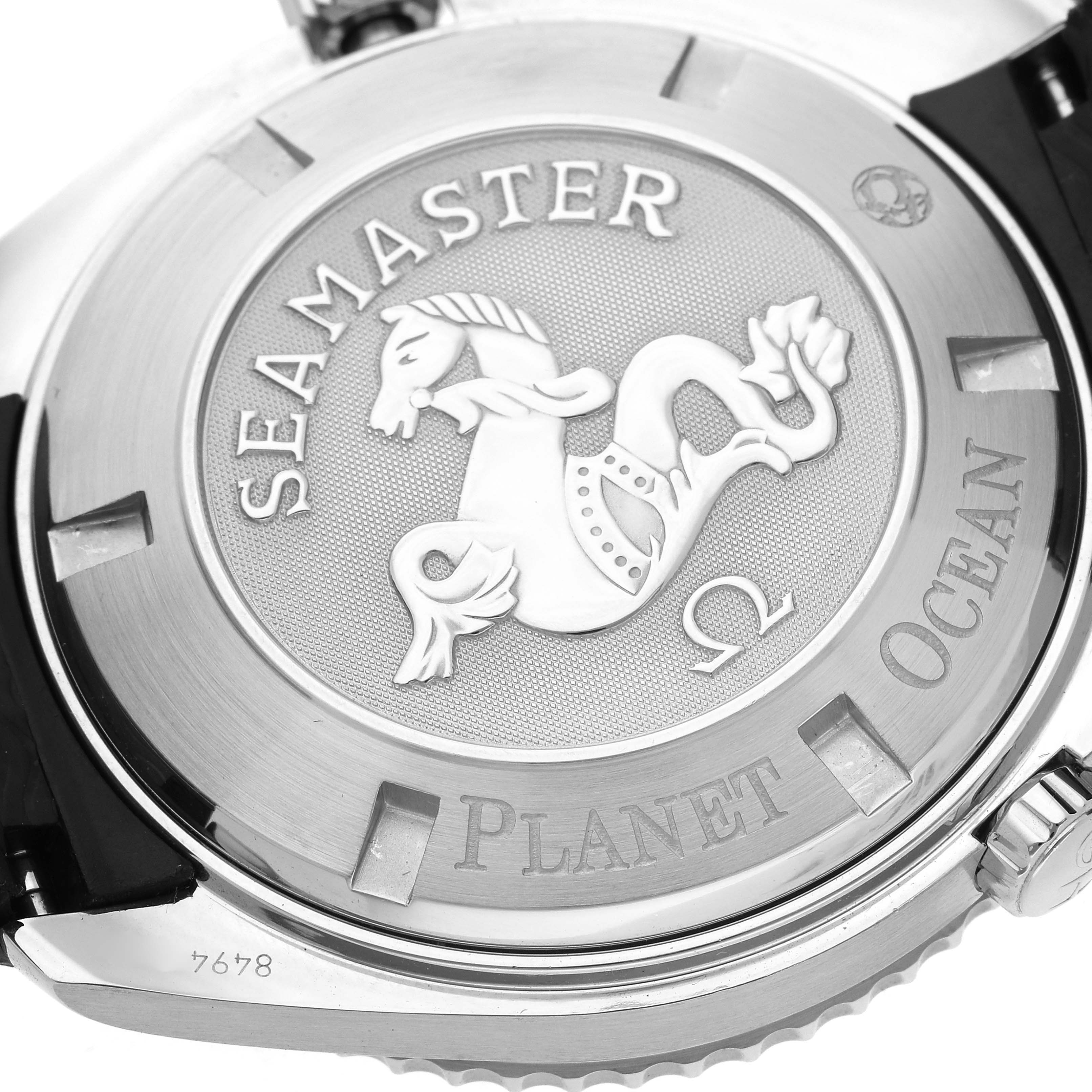The image shows the back case of an Omega Seamaster 2900.51.82 Men
s Stainless Steel Black Dial Planet Ocean watch, highlighting the engraved logo and text.