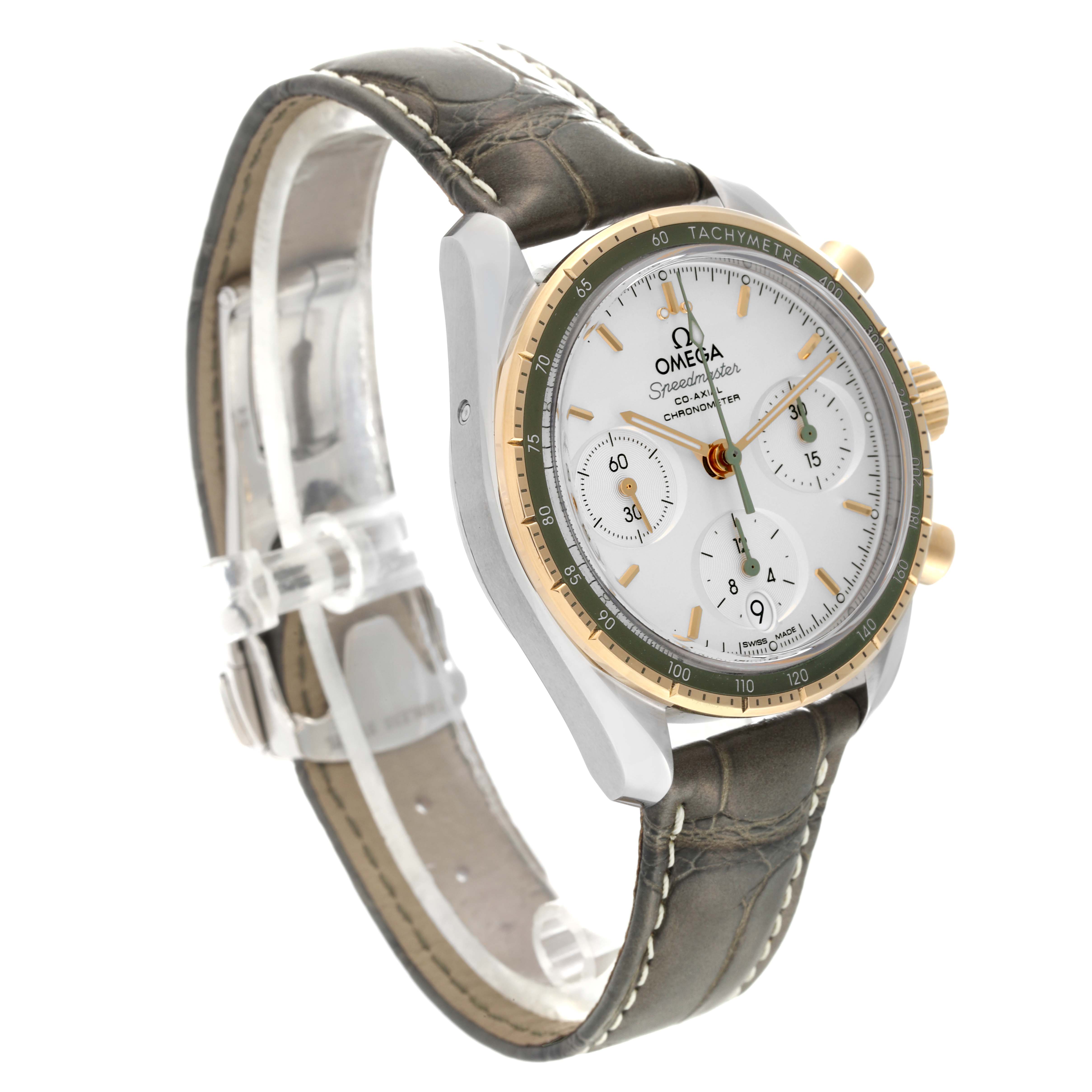 The image shows the Omega Speedmaster 324.23.38.50.02.001 Men's Steel and Gold (two tone) Silver Dial 324.23.38.50.02.001 Men's Steel and Gold (two tone) Silver Dial watch at a three-quarter angle, highlighting the face, casing, and partially the leather strap.