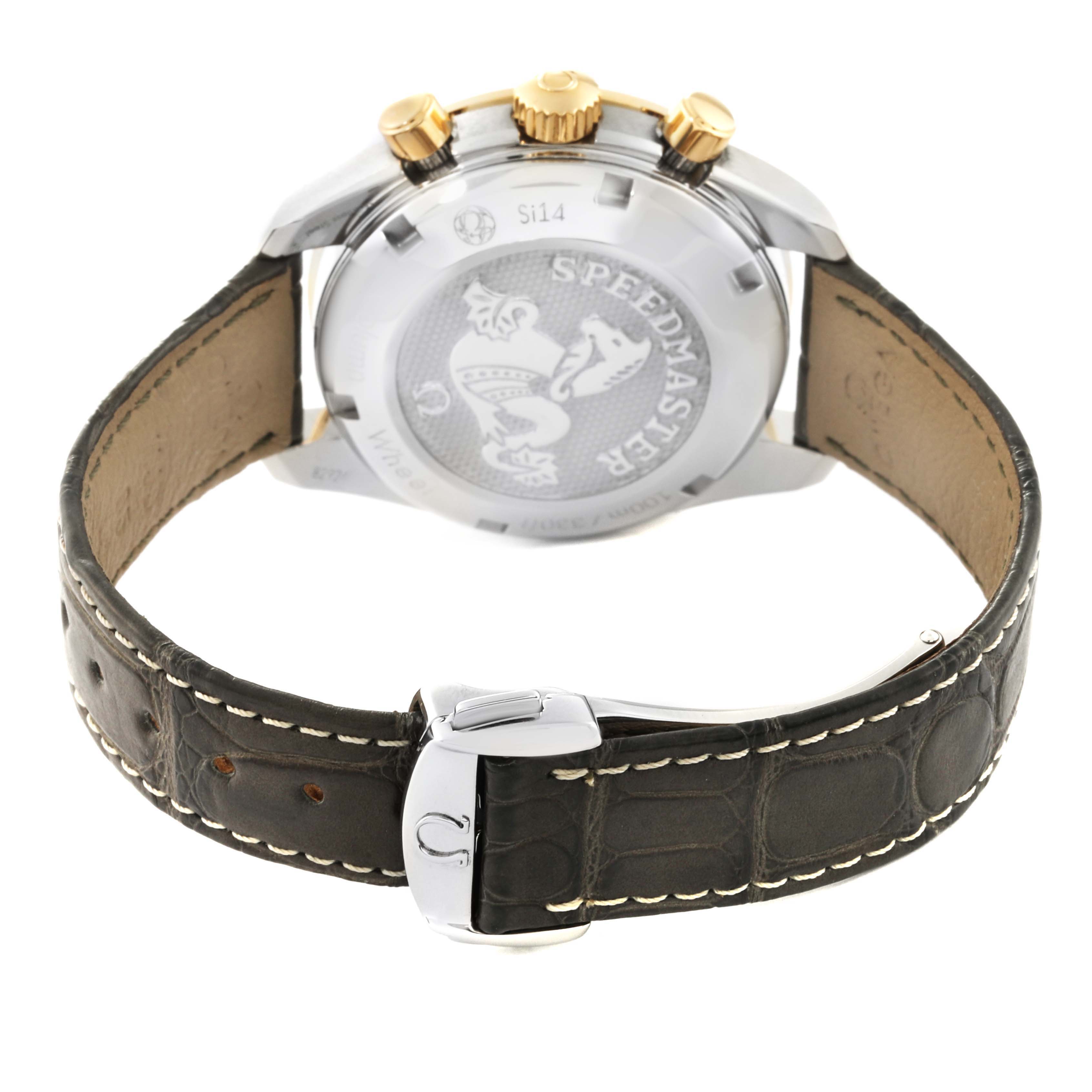 The image shows the back view of an Omega Speedmaster 324.23.38.50.02.001 Men's Steel and Gold (two tone) Silver Dial 324.23.38.50.02.001 Men's Steel and Gold (two tone) Silver Dial watch, highlighting the case back, strap, and clasp.