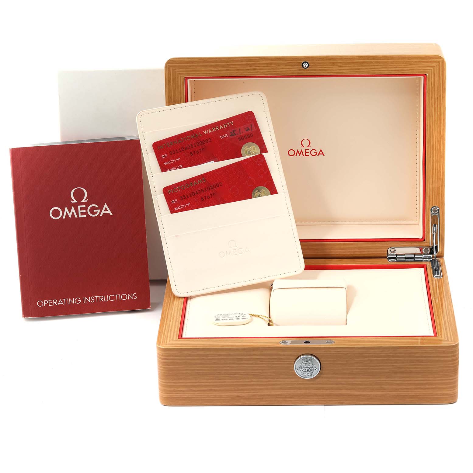 The image shows an Omega Speedmaster 331.10.42.51.02.002 Men's Stainless Steel Silver Dial 331.10.42.51.02.002 Men's Stainless Steel Silver Dial watch box, operating instructions, warranty cards, and a watch cushion.
