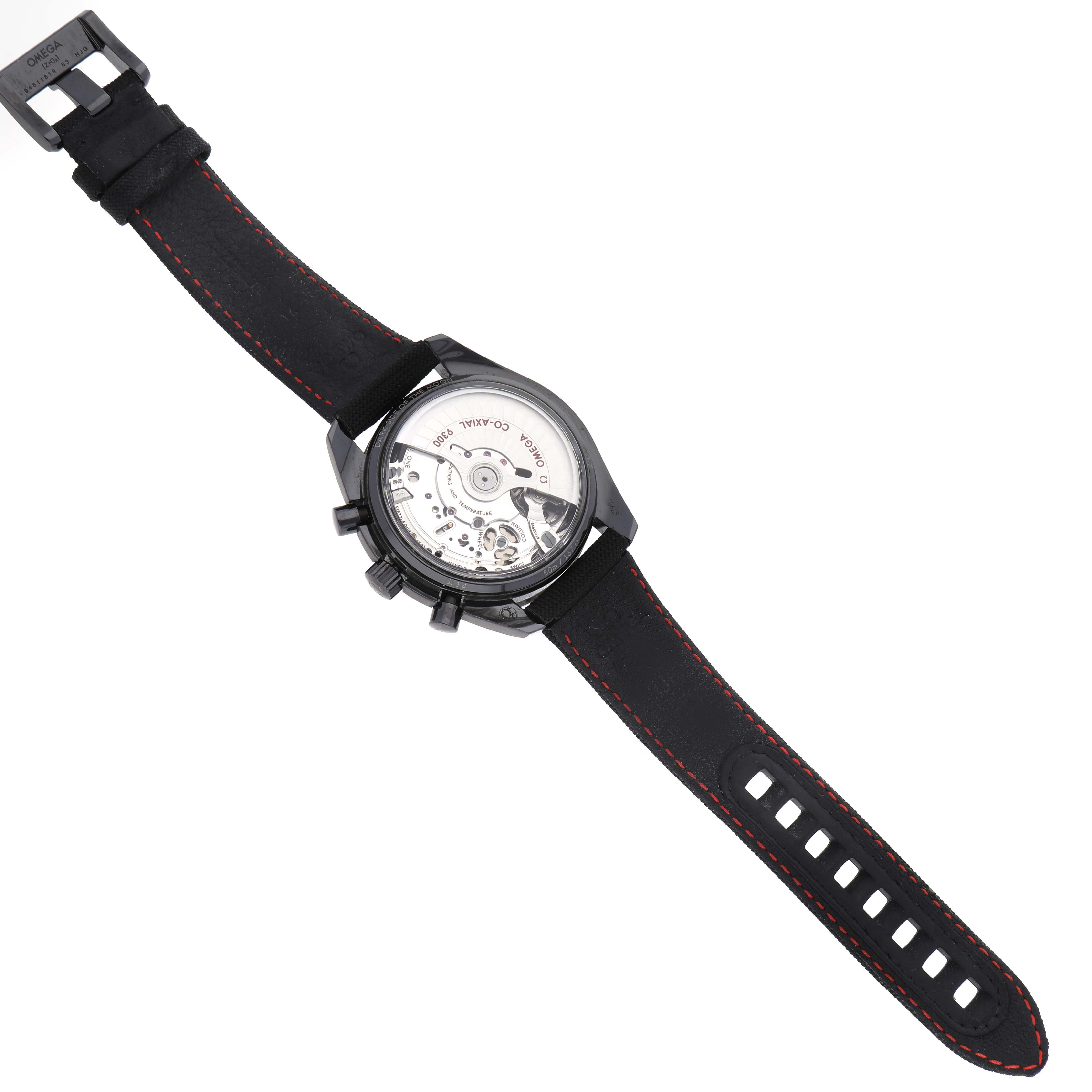 The image shows the back view of an Omega Speedmaster 311.92.44.51.01.003 Men's Ceramic Black Dial 311.92.44.51.01.003 Men's Ceramic Black Dial watch highlighting its transparent case back and movement, along with its black leather strap.