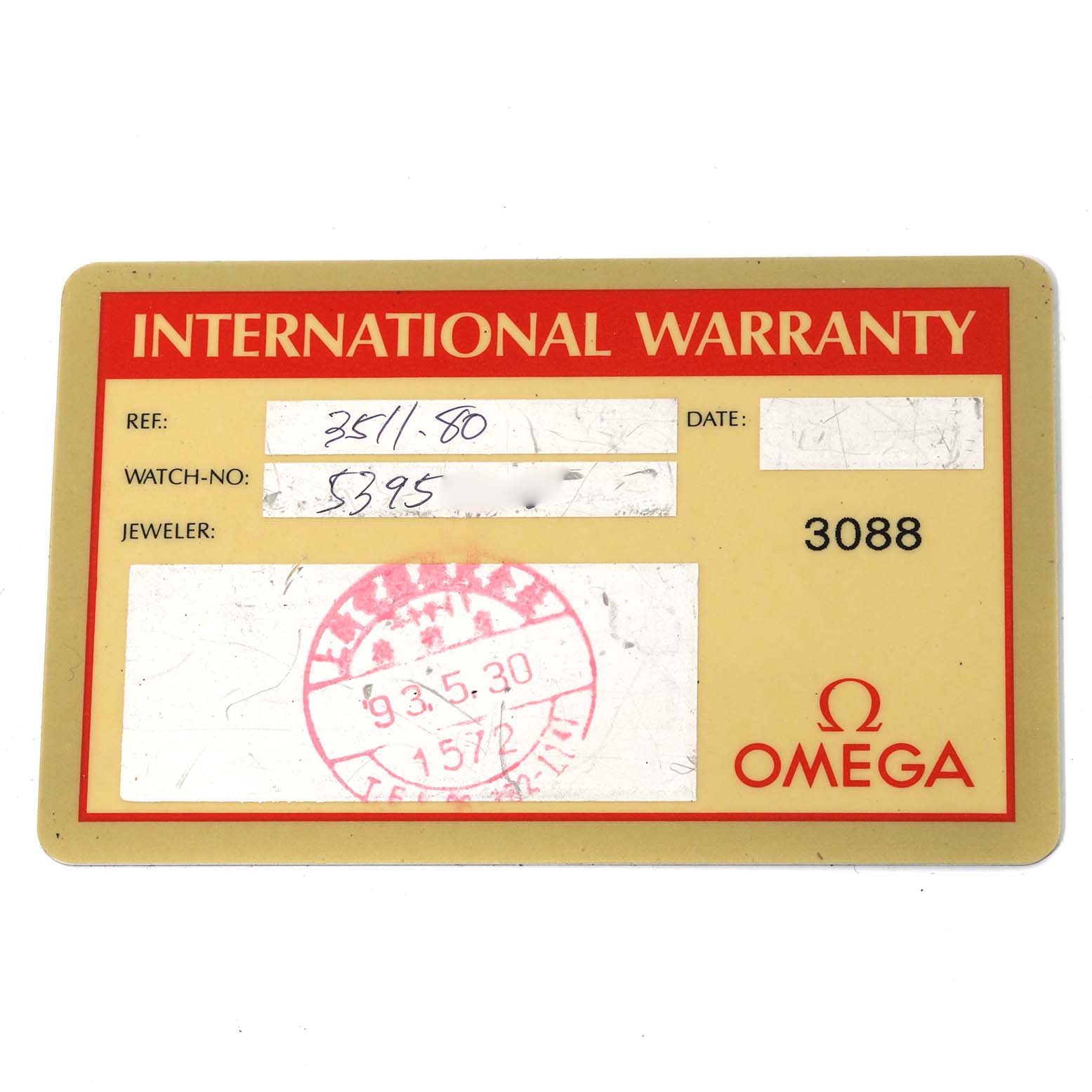 This image shows the international warranty card for an Omega Speedmaster 3511.80.00 Men
s Stainless Steel Blue Dial 3511.80.00 Men
s Stainless Steel Blue Dial watch, displaying the reference and watch number.