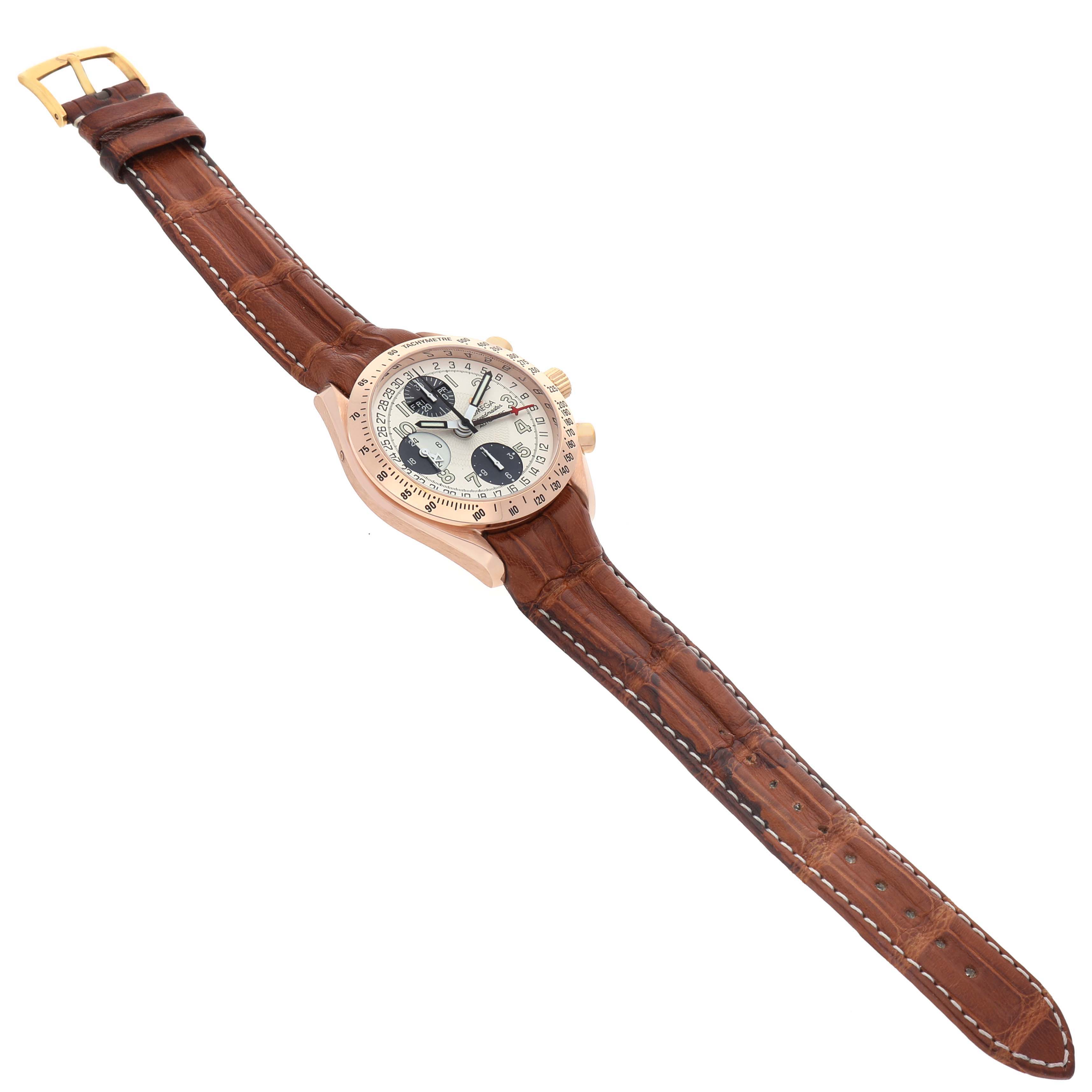 The Omega Seamaster 3623.33.21 Men's Rose Gold Silver Dial watch is shown from an angled top view, highlighting its dial, case, and brown leather strap.