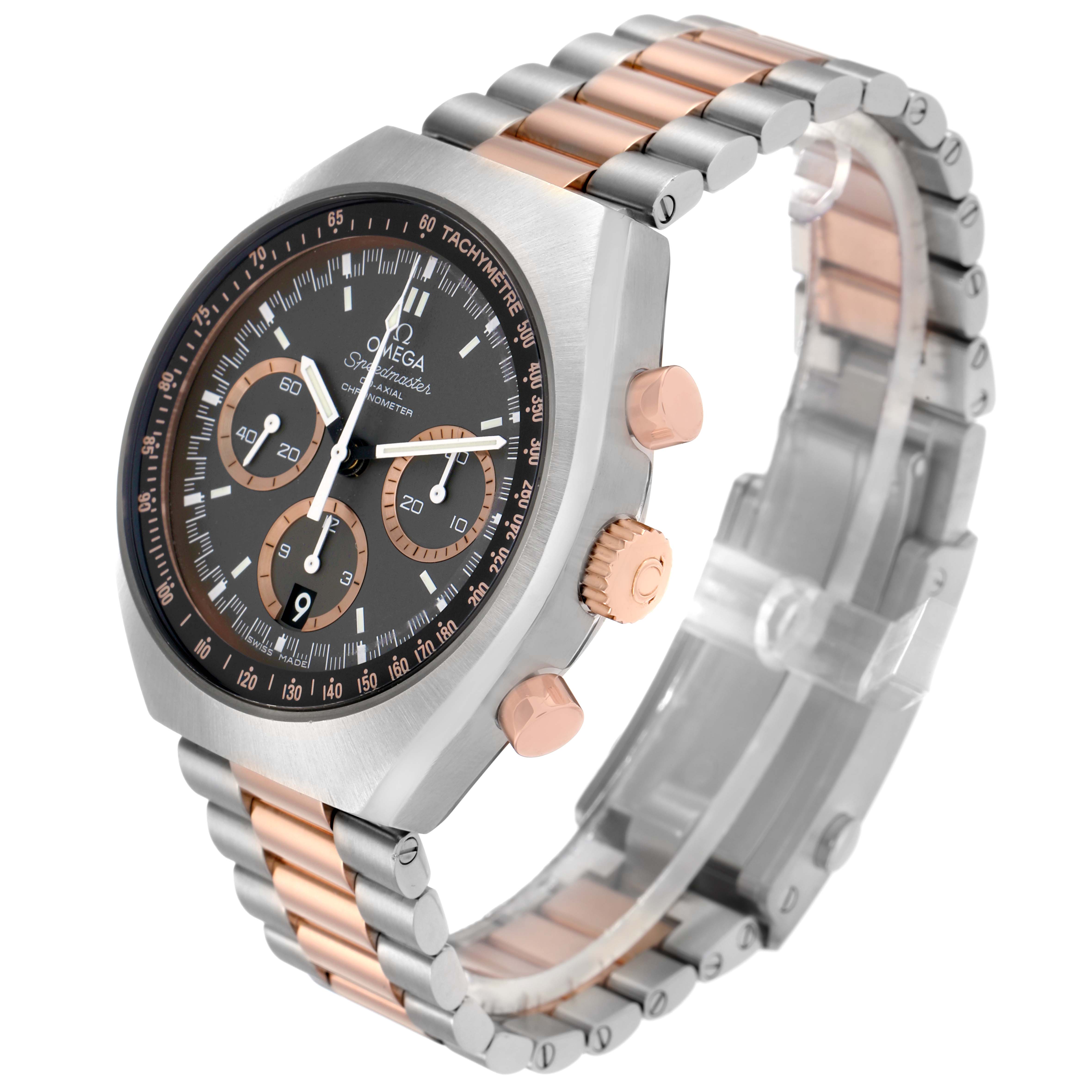 The Omega Speedmaster 327.20.43.50.01.001 Men
s Steel and Gold (two tone) Grey Dial watch is shown at an oblique angle highlighting its face, bezel, crown, pushers, and bracelet.