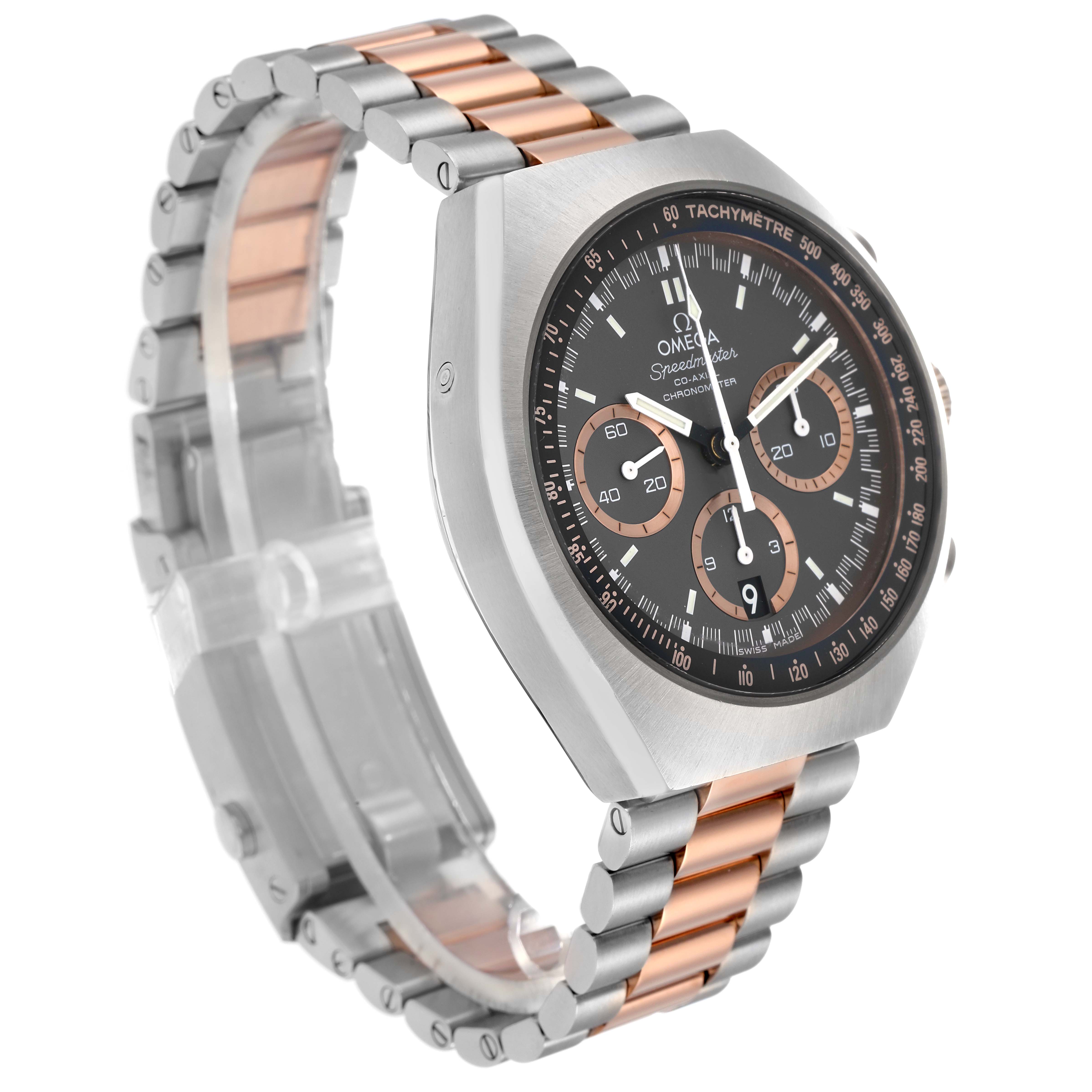 The Omega Speedmaster 327.20.43.50.01.001 Men
s Steel and Gold (two tone) Grey Dial watch is shown at a three-quarter angle, highlighting its dial, bezel, and two-tone bracelet.