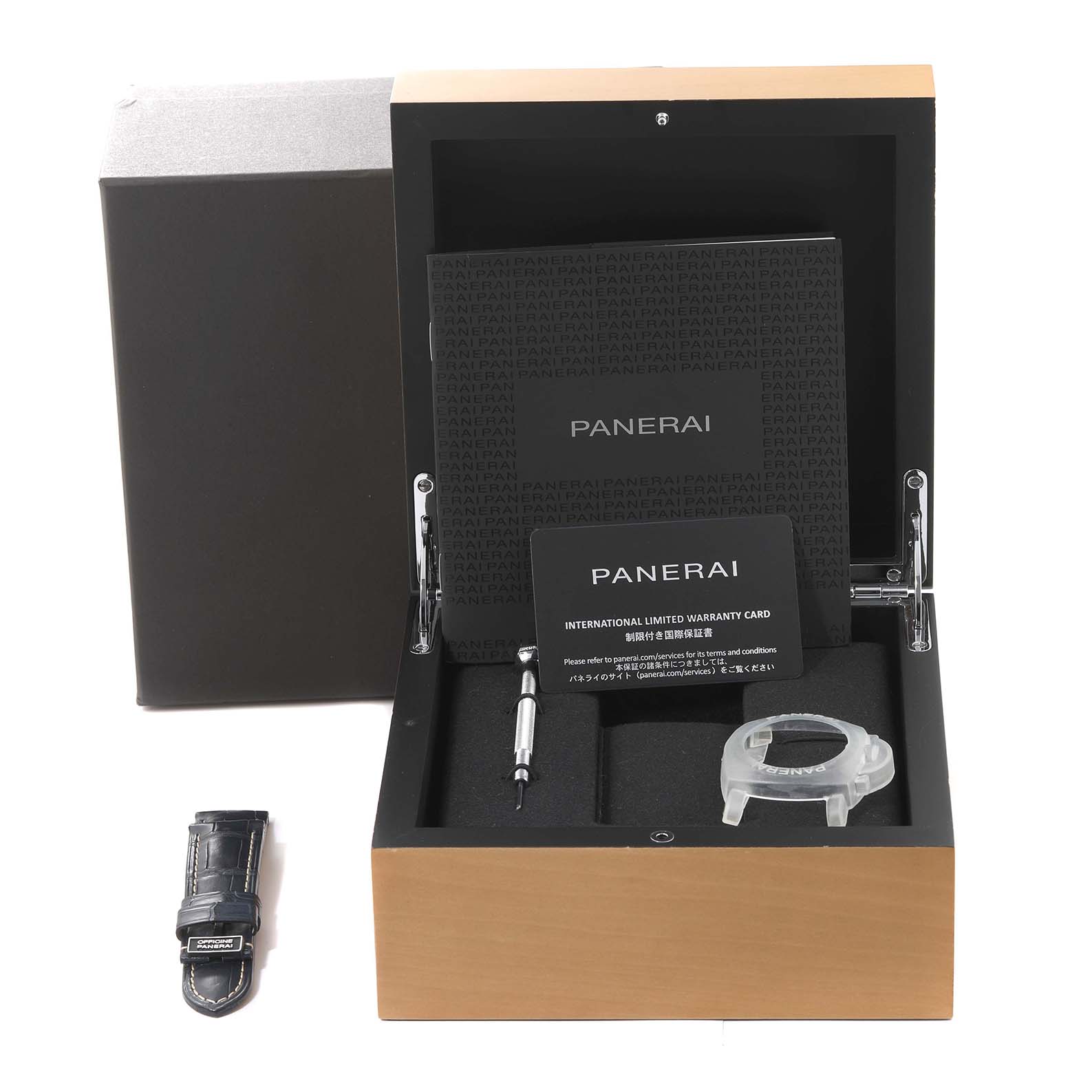 The image shows an open Panerai Luminor PAM01112 Men
s Rose Gold Blue Dial PAM01112 Men
s Rose Gold Blue Dial watch box with accessories including a leather strap, screwdriver, and warranty card.