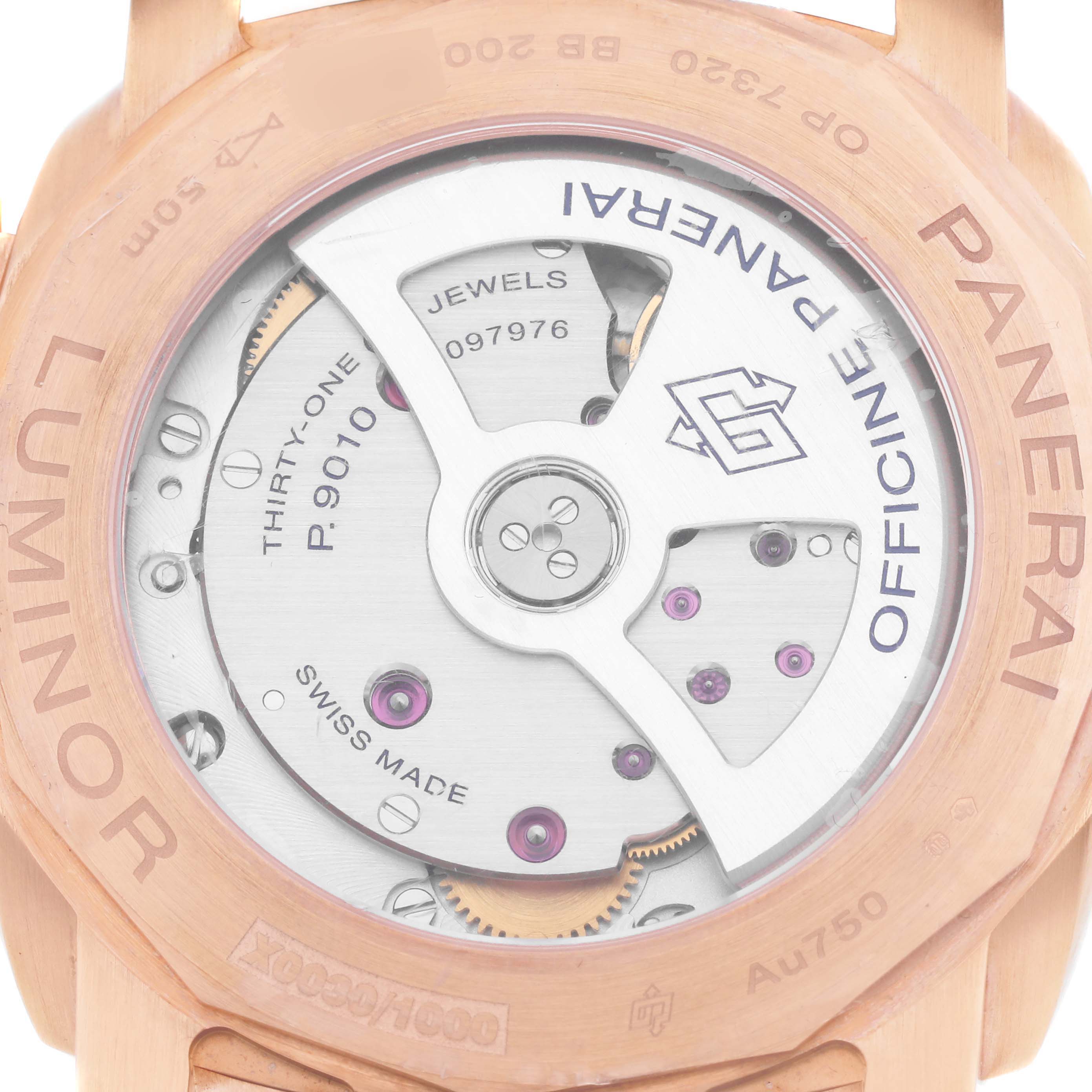 The image shows the back of a Panerai Luminor PAM01112 Men
s Rose Gold Blue Dial PAM01112 Men
s Rose Gold Blue Dial watch, highlighting its internal mechanism and engravings.