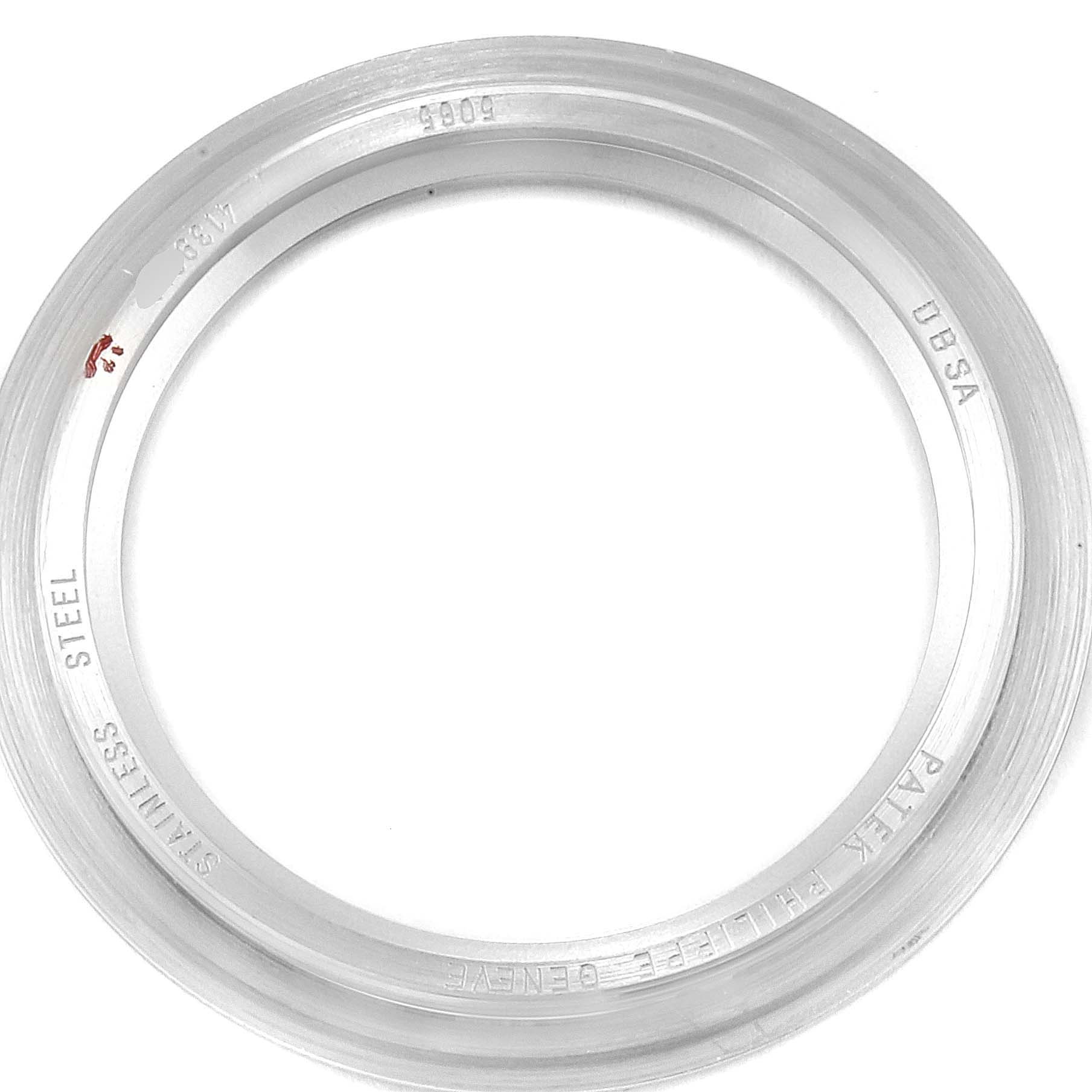 This image shows the stainless steel bezel for a Patek Philippe Aquanaut 5065/1A-010 Men
s Stainless Steel Black Dial 5065/1A-010 Men
s Stainless Steel Black Dial model, viewed from a top angle.