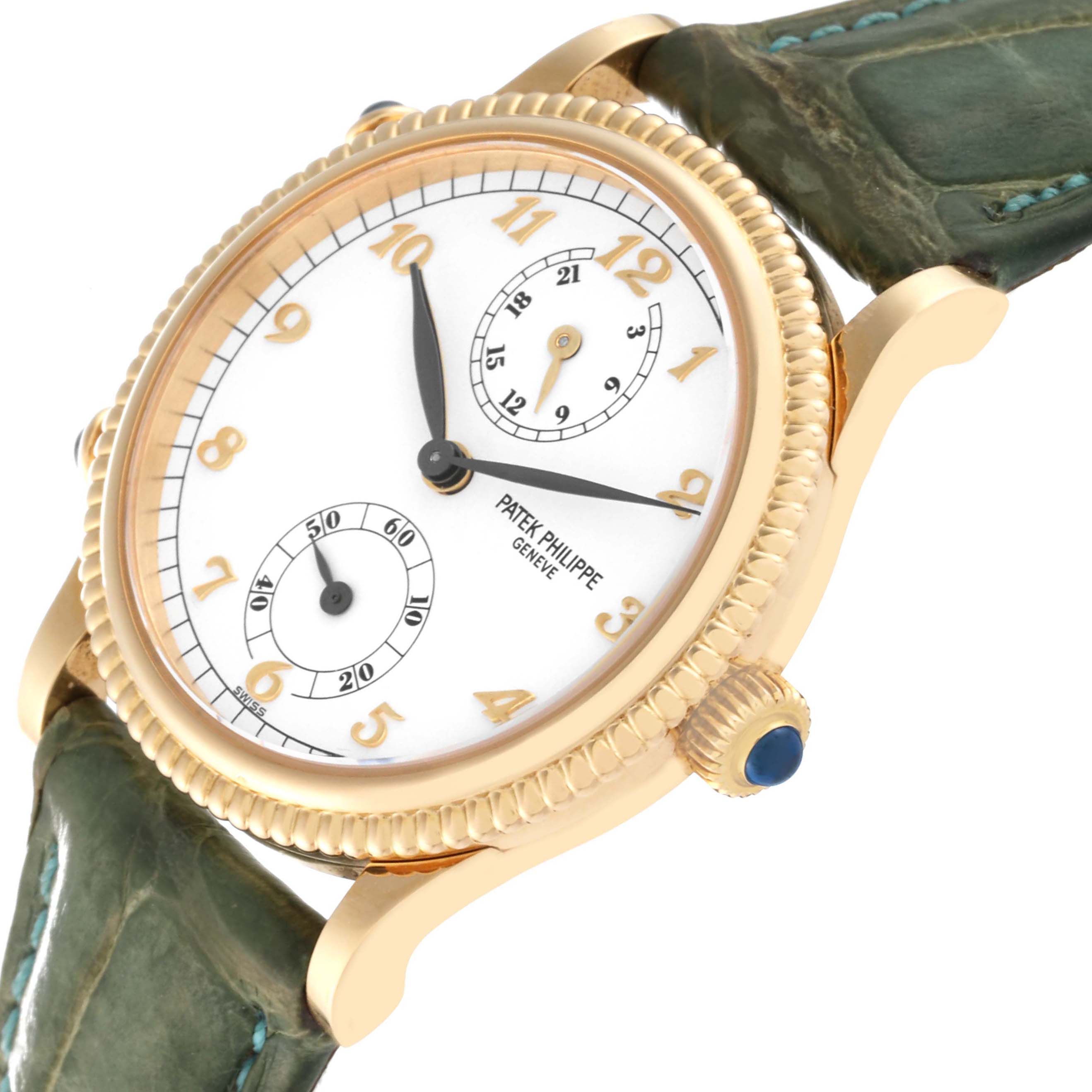 This image shows a Patek Philippe Calatrava 4864J-001 Women's Yellow Gold White Dial 4864J-001 Women's Yellow Gold White Dial model watch from an oblique angle, highlighting the face, crown, and part of the strap.