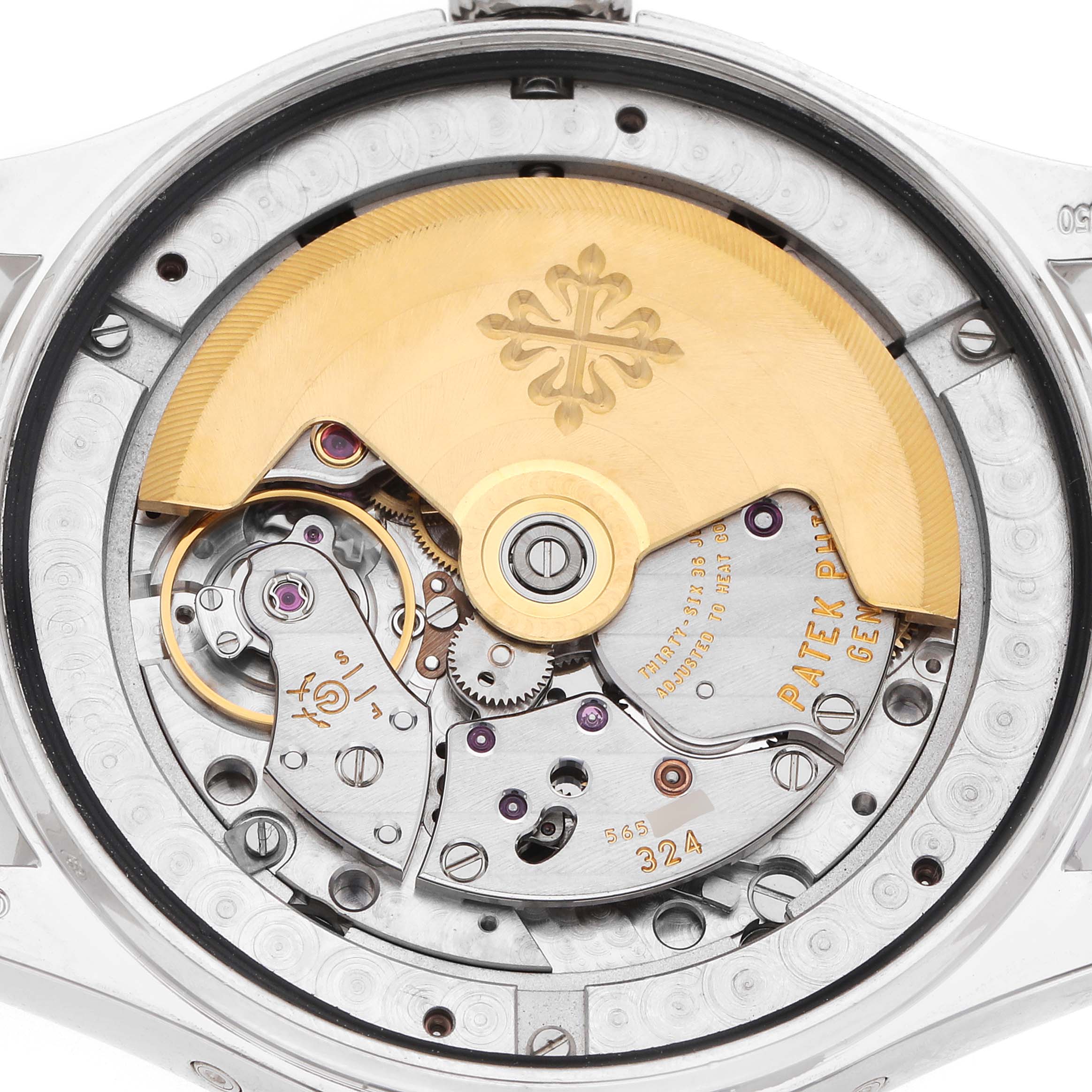 The image shows the back of the Patek Philippe Complications 5146P-001 Men's White Gold Grey Dial watch, highlighting its intricate movement and rotor.