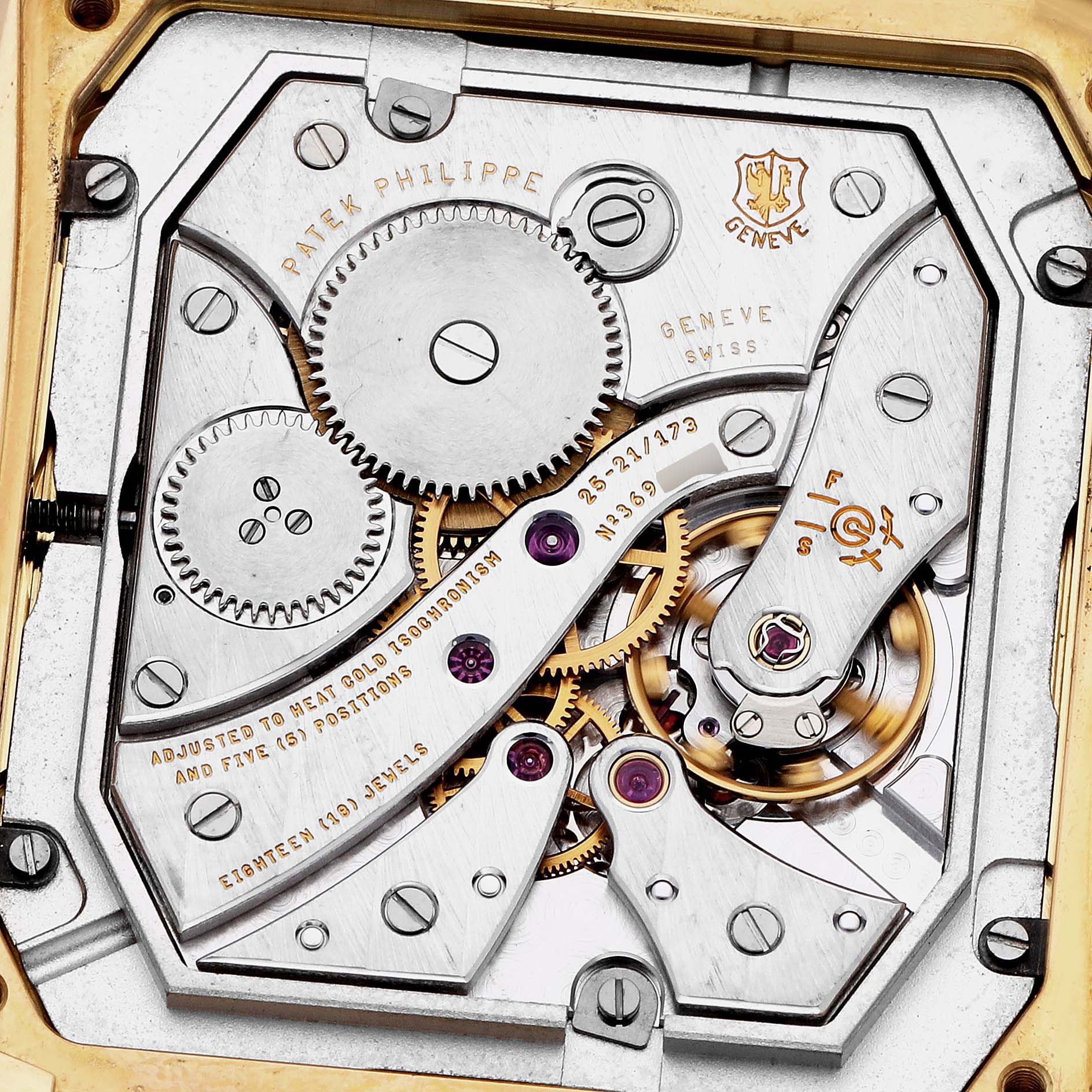 The image shows the movement of a Patek Philippe Gondolo 5124J 5124J Men
s Yellow Gold Silver Dial watch from a top-down angle, highlighting gears and jewels.