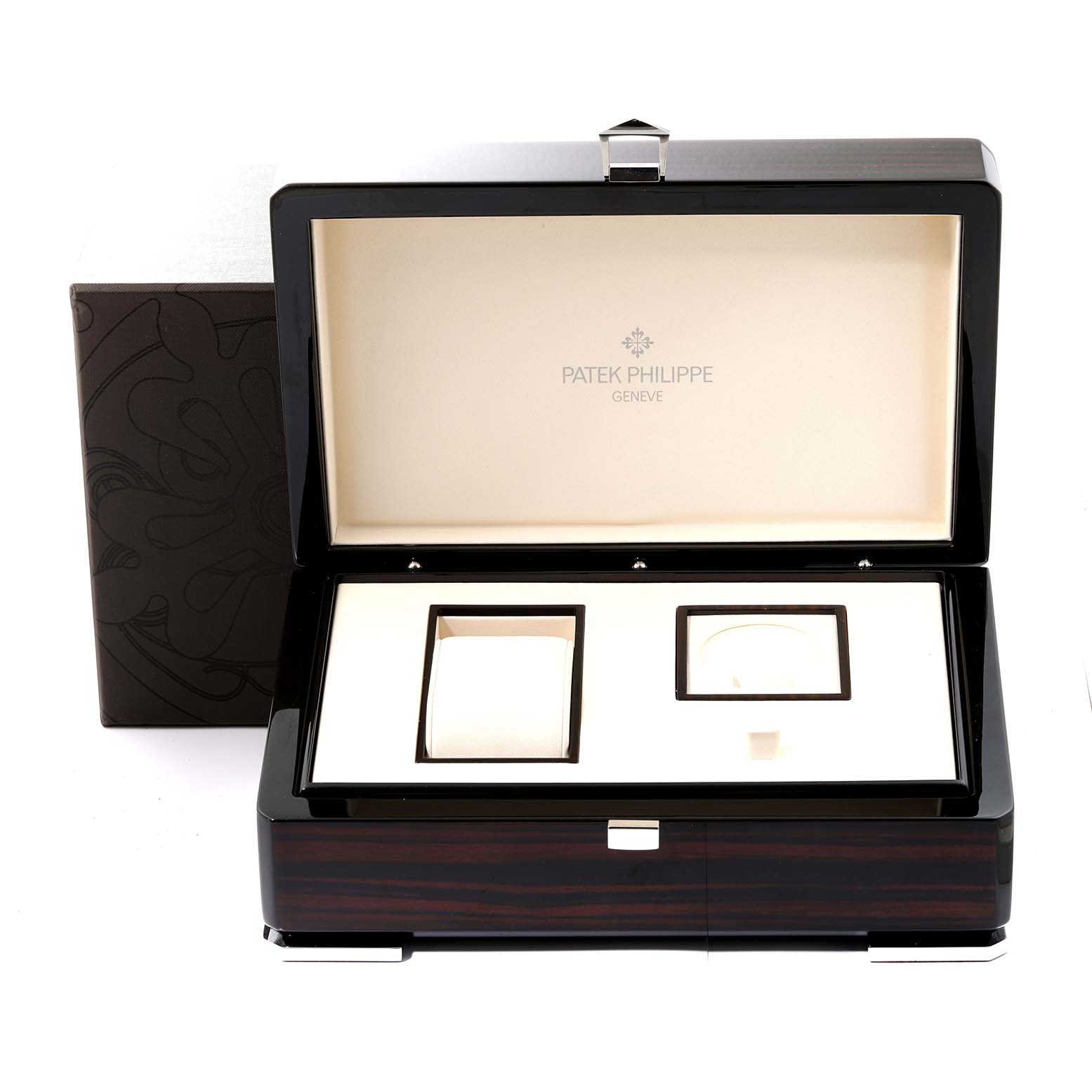 This is a top-down view of a Patek Philippe Nautilus 7011/1R Women's Rose Gold Grey Dial 7011/1R Women's Rose Gold Grey Dial watch box, showing the interior compartments.