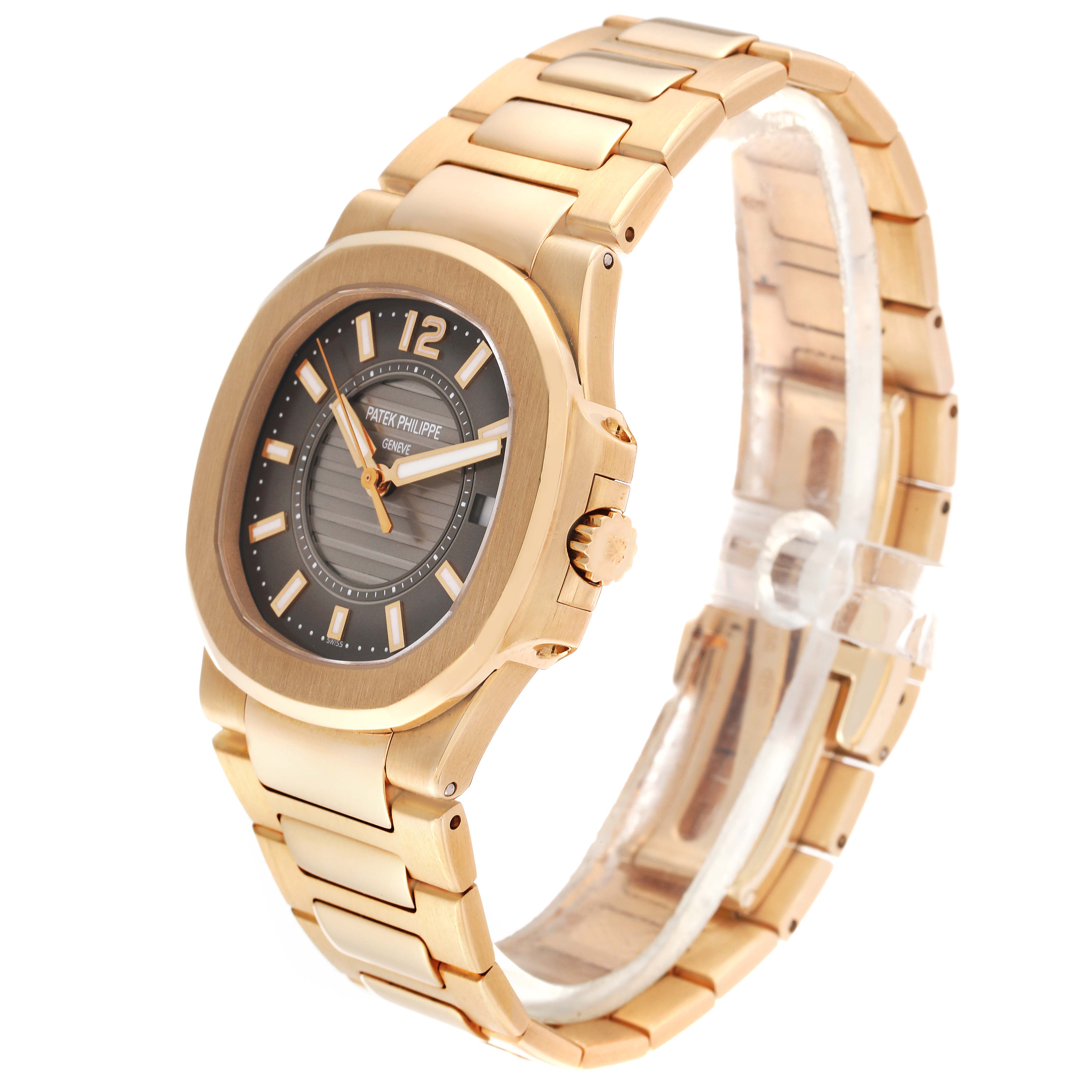 This image shows a side-angle view of a Patek Philippe Nautilus 7011/1R Women's Rose Gold Grey Dial 7011/1R Women's Rose Gold Grey Dial watch, highlighting its gold bracelet, case, and dial.