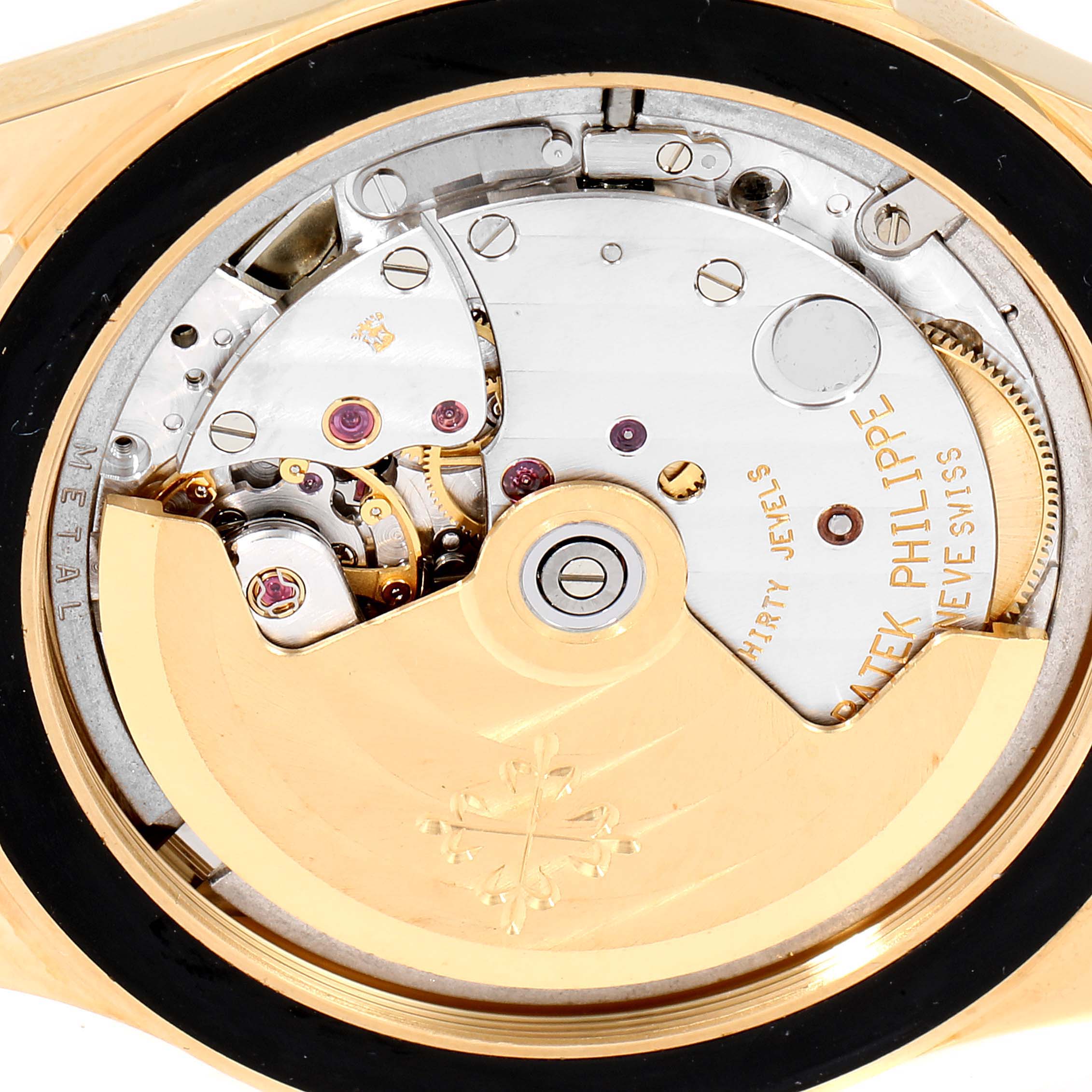 The image shows the back view of the Patek Philippe Neptune 5081 Men's Yellow Gold Black Dial 5081 Men's Yellow Gold Black Dial model, revealing its internal mechanical movement.