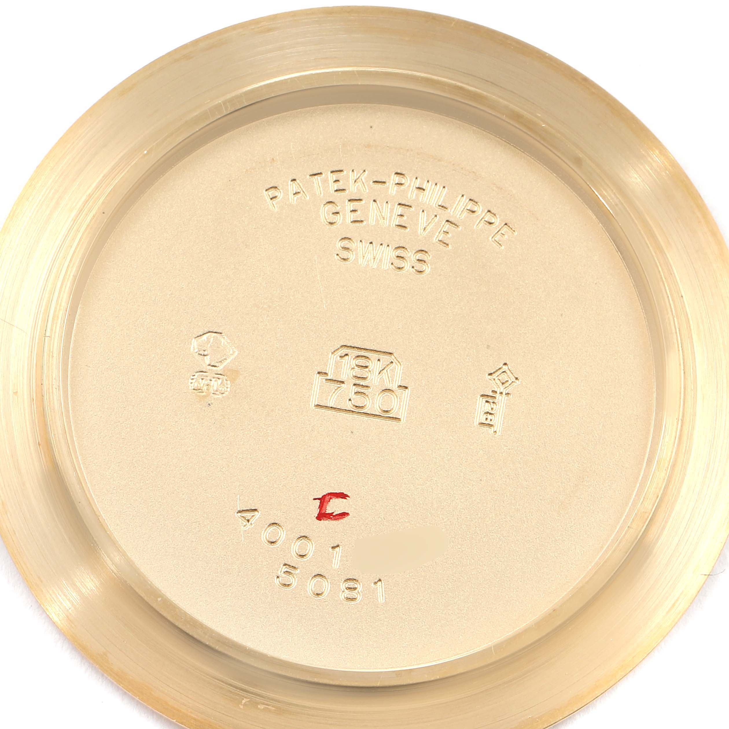 This is the backside of the Neptune model by Patek Philippe, showing the inner case back with engravings and hallmarks.