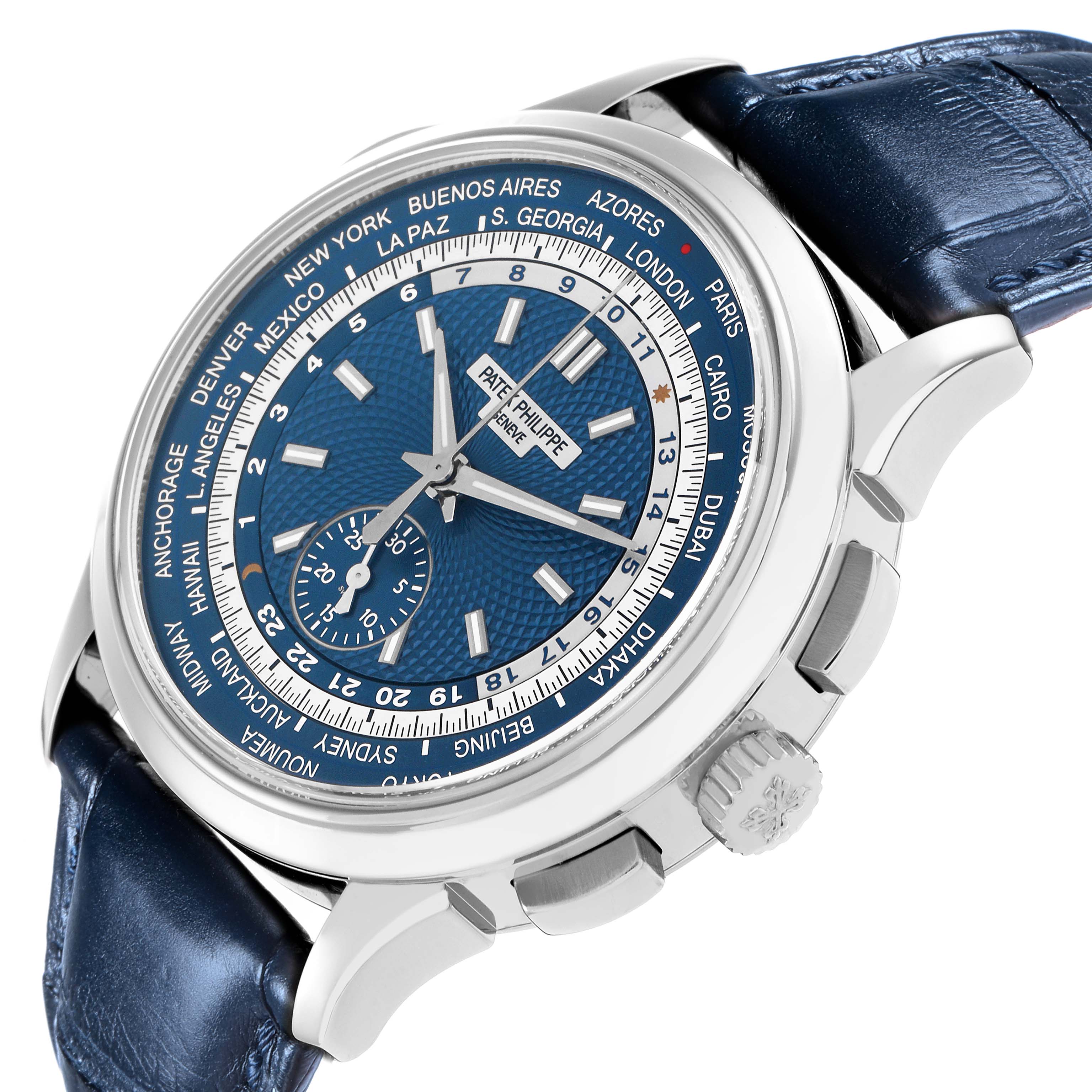The Patek Philippe Complications 5930G-001 Men
s White Gold Blue Dial watch is shown from an angled side view, displaying the face, crown, and a portion of the leather strap.